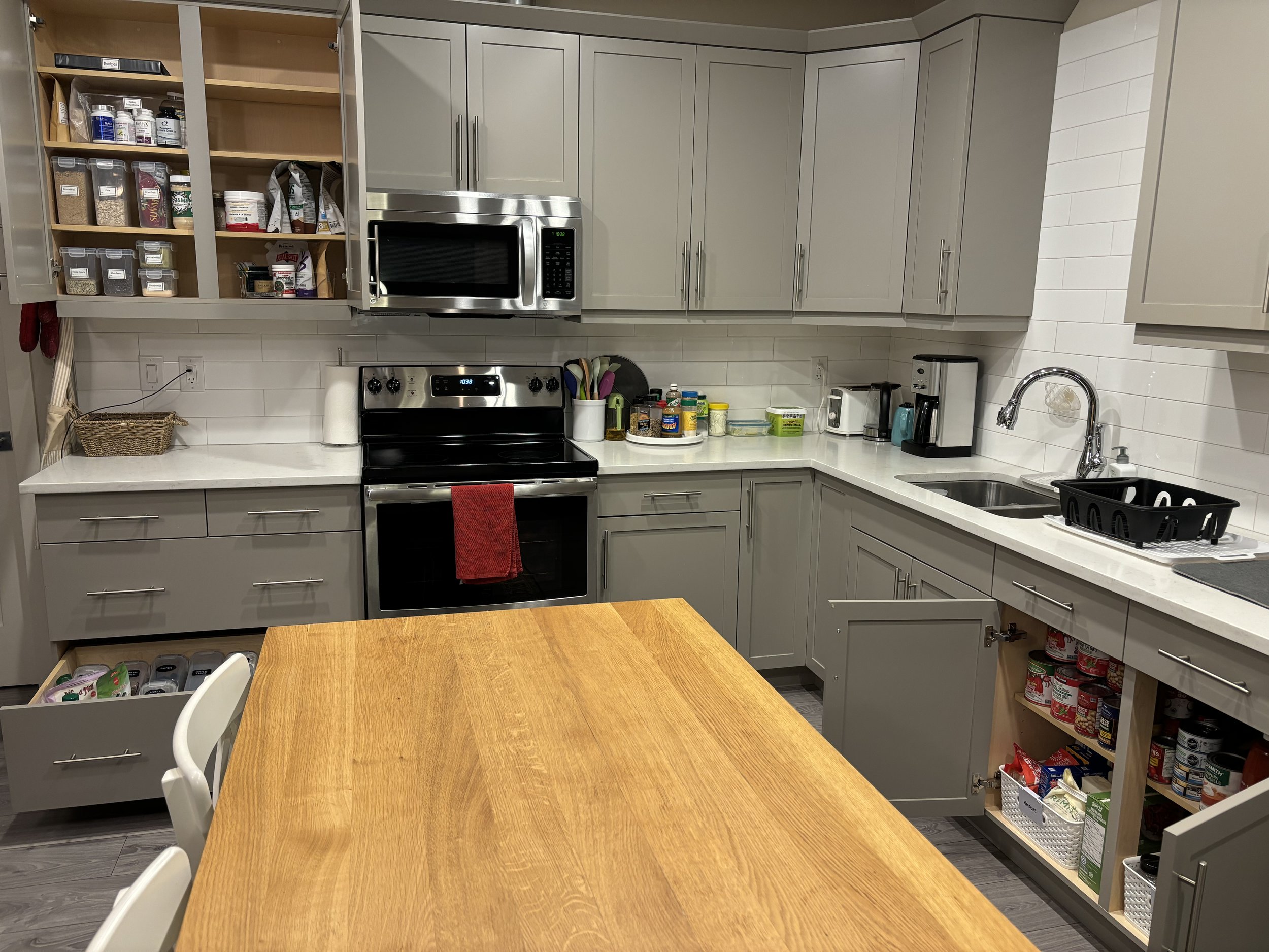 AFTER: 
✅ Simplified 4 zones
✅ Created a dedicated wellness cabinet
✅ Clear, calming space to support daily routines