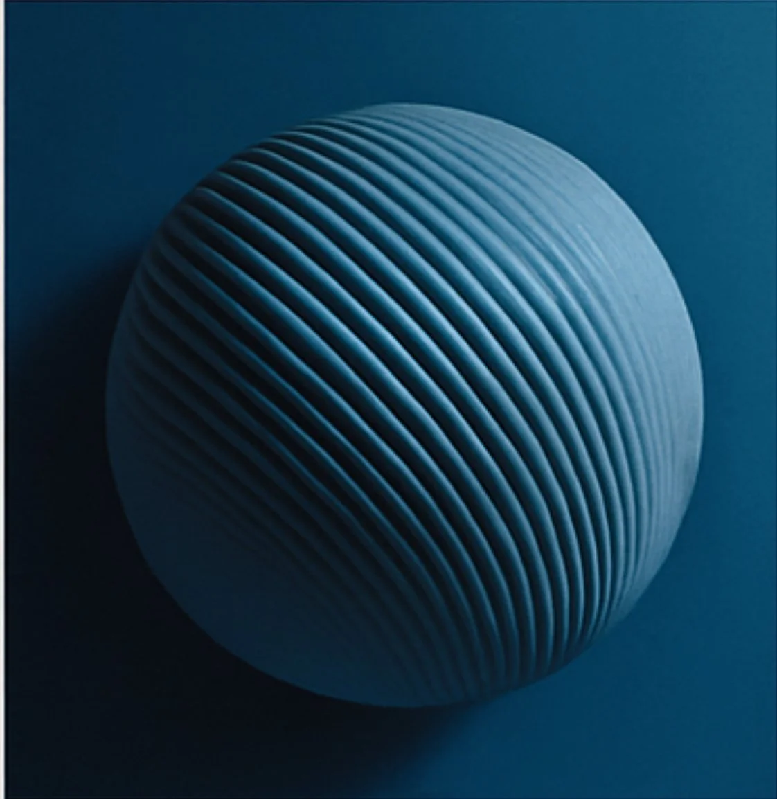 A blue sphere with evenly spaced ridges, isolated on a dark background.