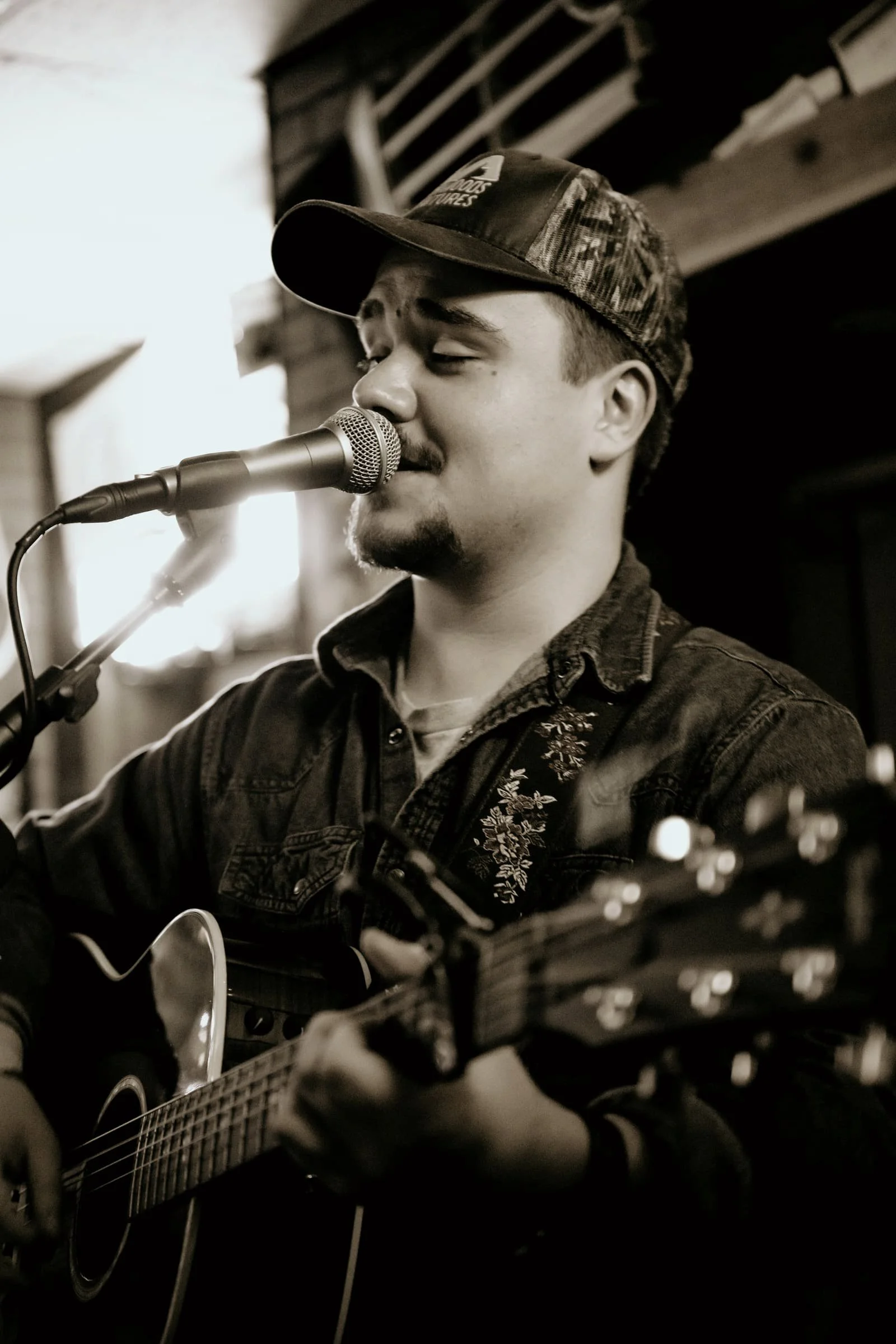 TheoLinebaugh_Live_CloseUp_Singing_BW.jpg
