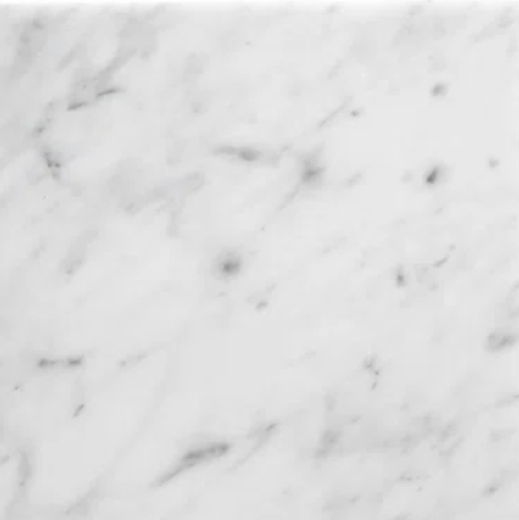 Close-up of a white marble surface with gray veining