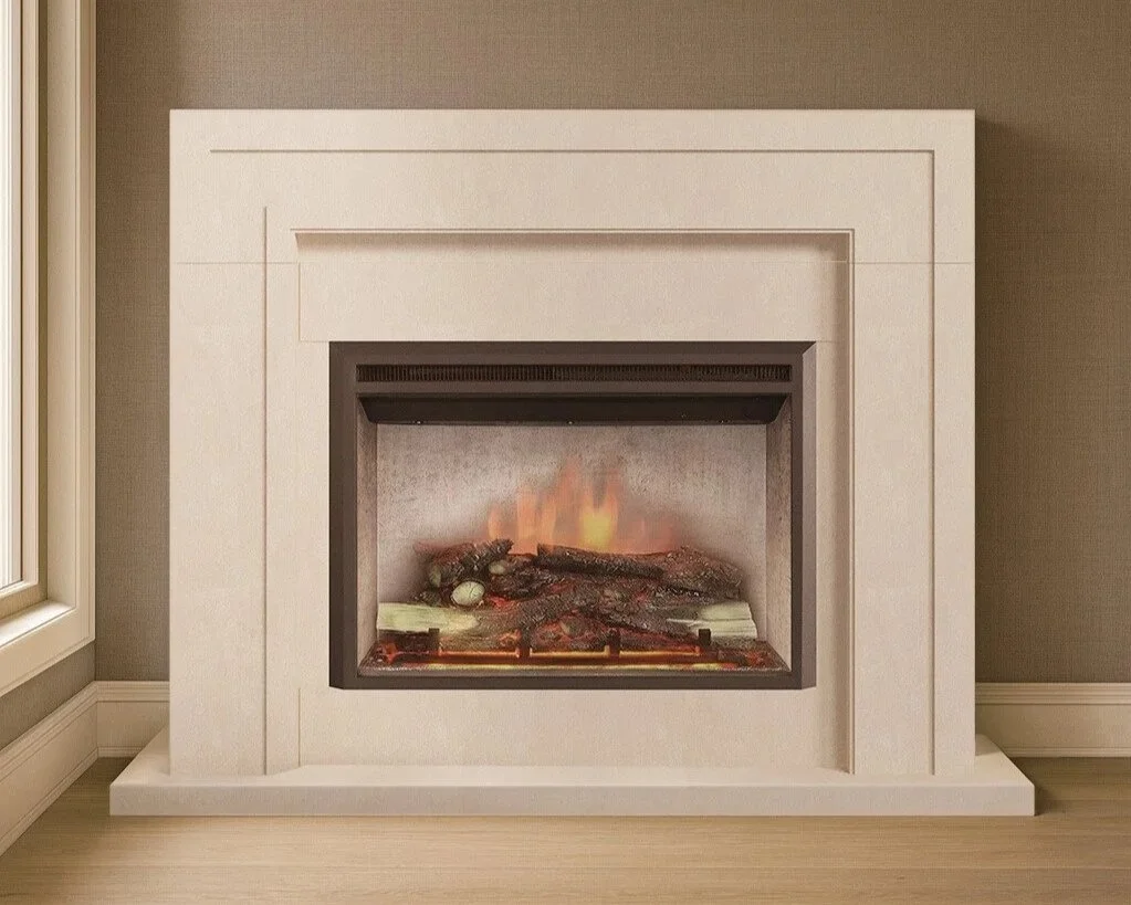 A white fireplace with a small fire burning inside, situated against a beige wall in a room with light wood flooring.