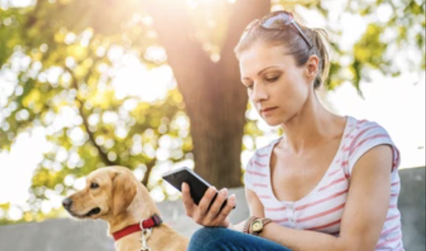 Individual interacting with Bluecarta AI Agent through her smartphone