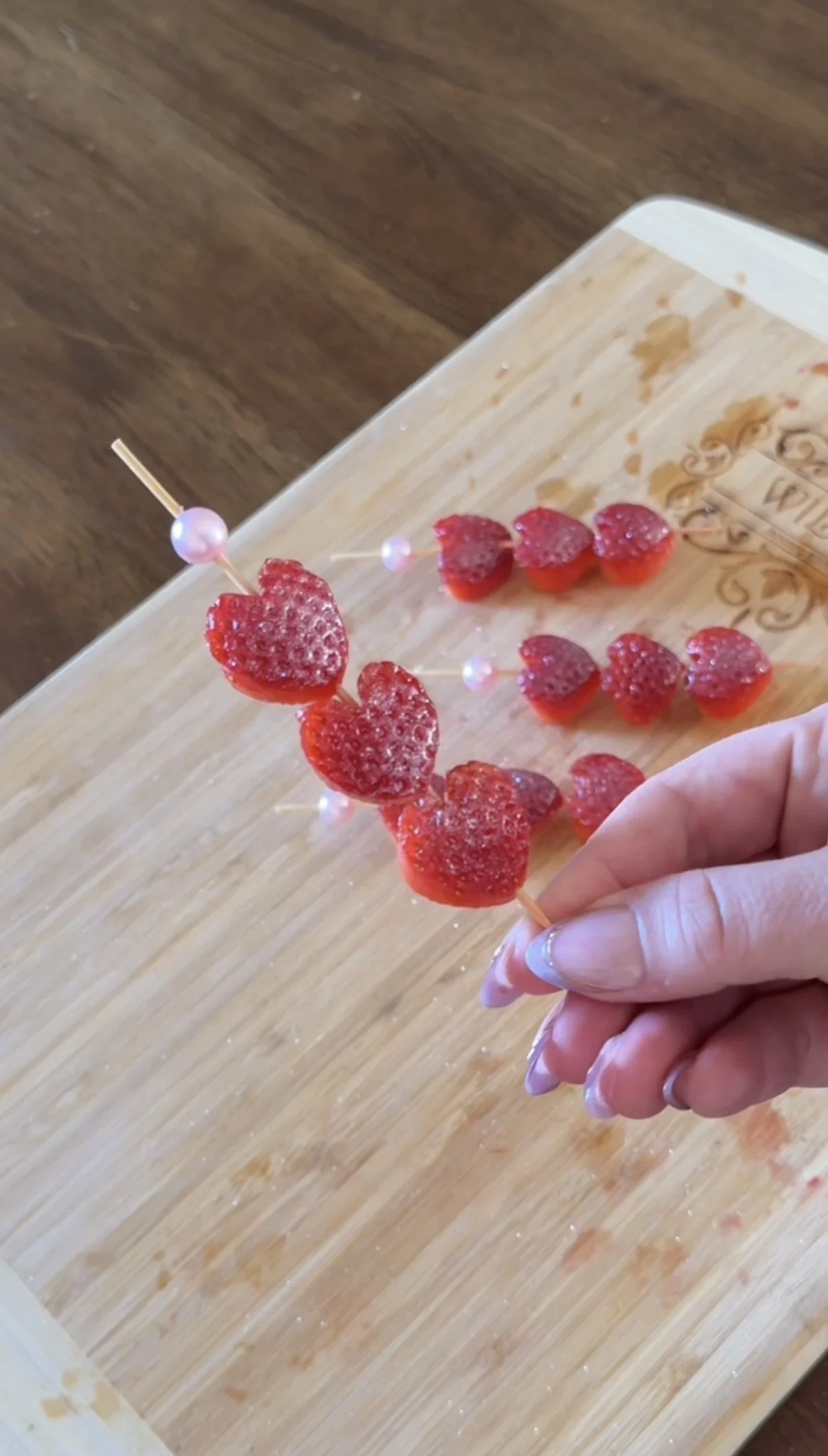 Easy Strawberry Garnish on Wine Glass