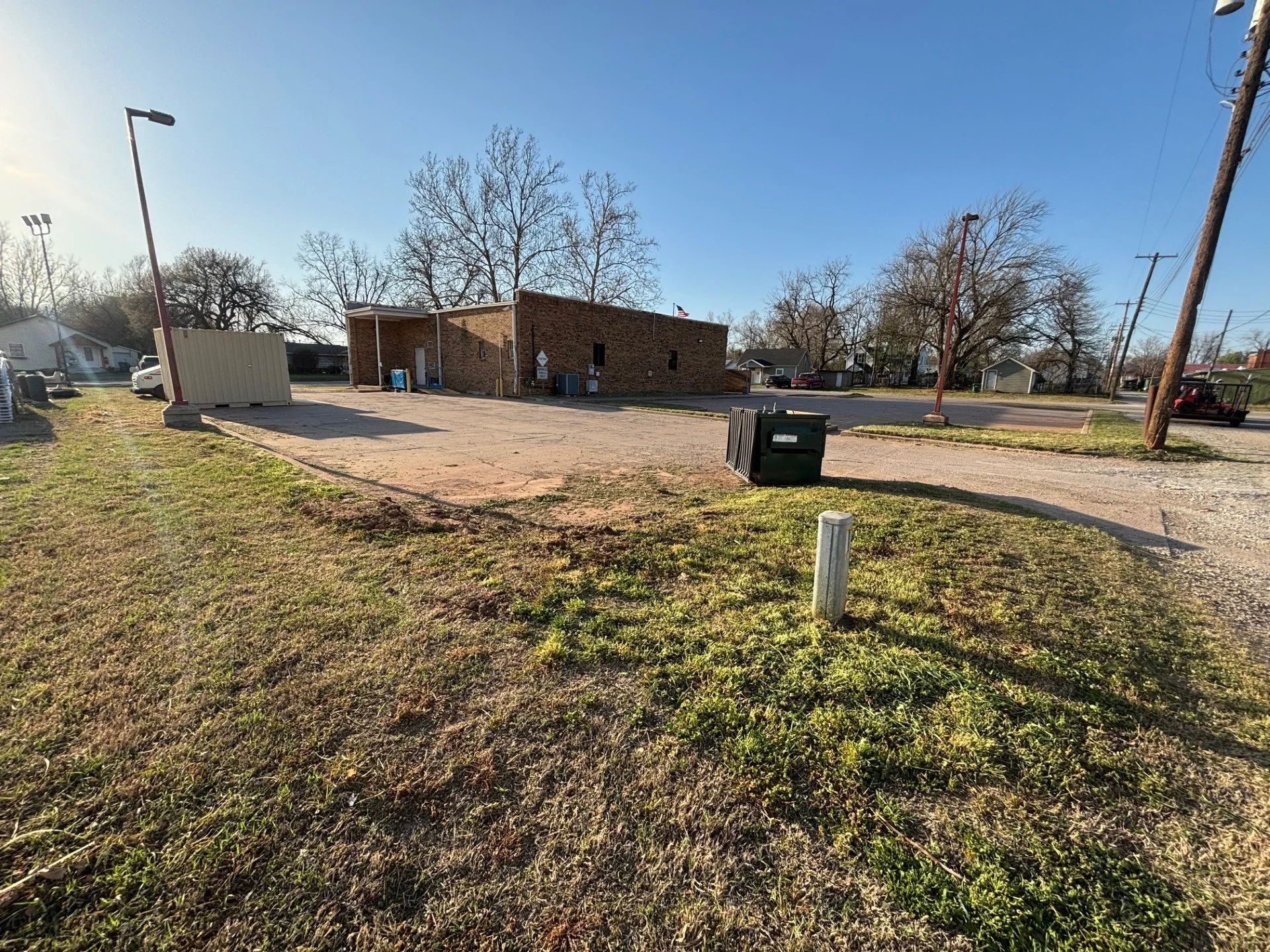 Biweekly lawn care service in Perkins, Oklahoma – maintained post office property and surrounding grounds