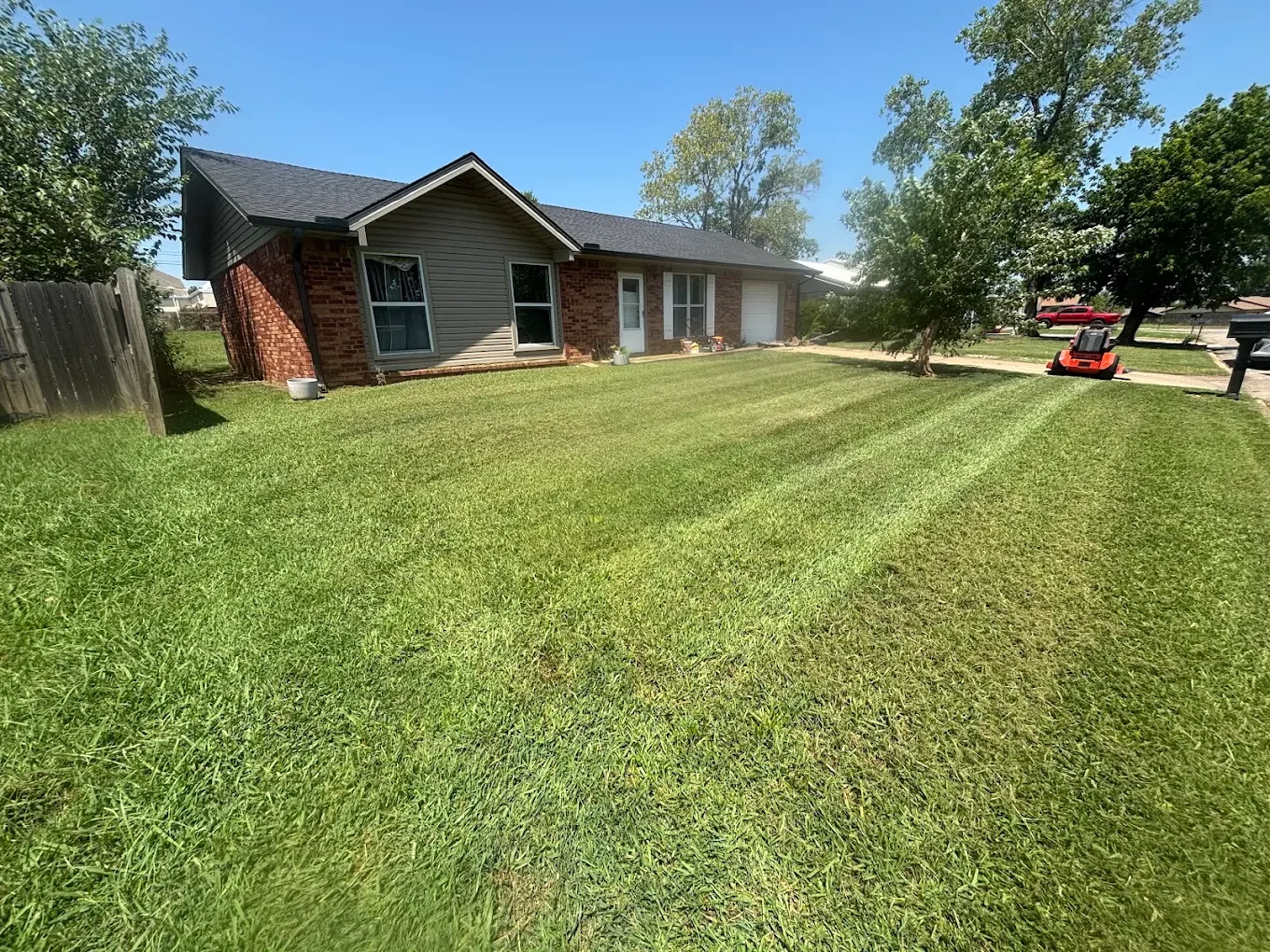 Routine lawn maintenance — mowing, trimming, edging, and cleanup.