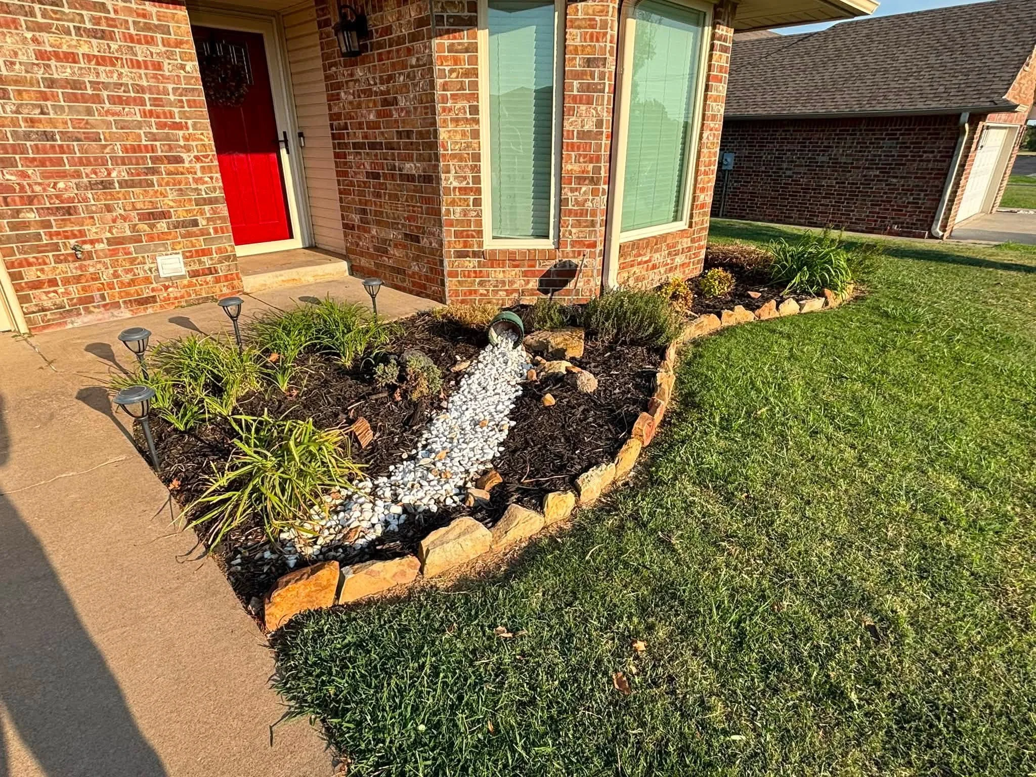 Monthly landscape bed maintenance — weed control, cleanup, pruning, and bed detailing.