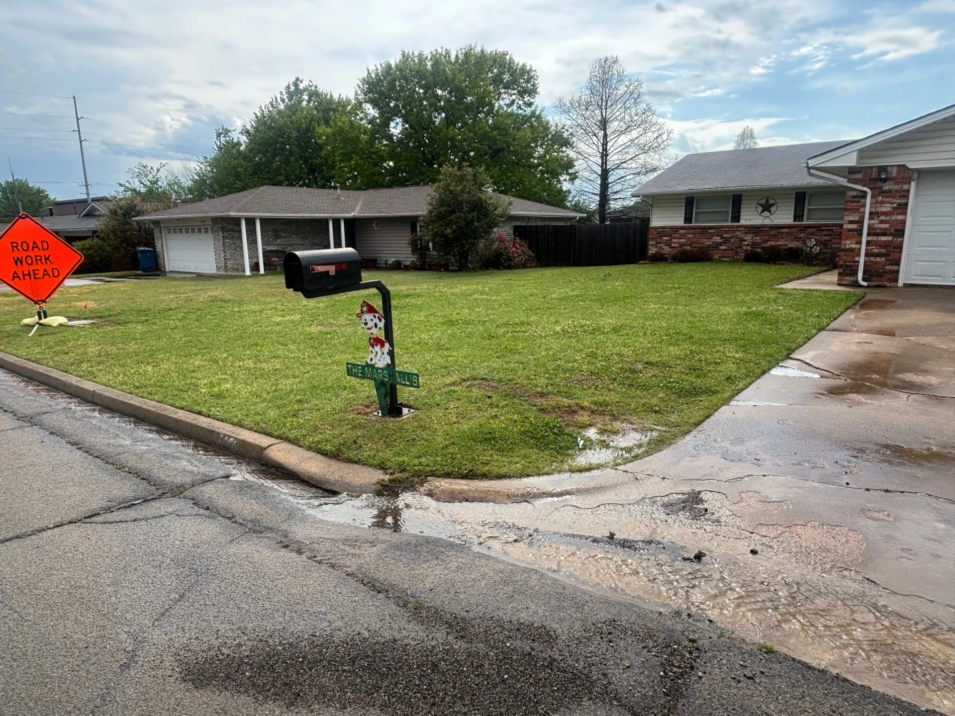 Lawn care in Cushing, Oklahoma the day after service. Fresh cut grass, clean edges, and a professionally maintained finish.
