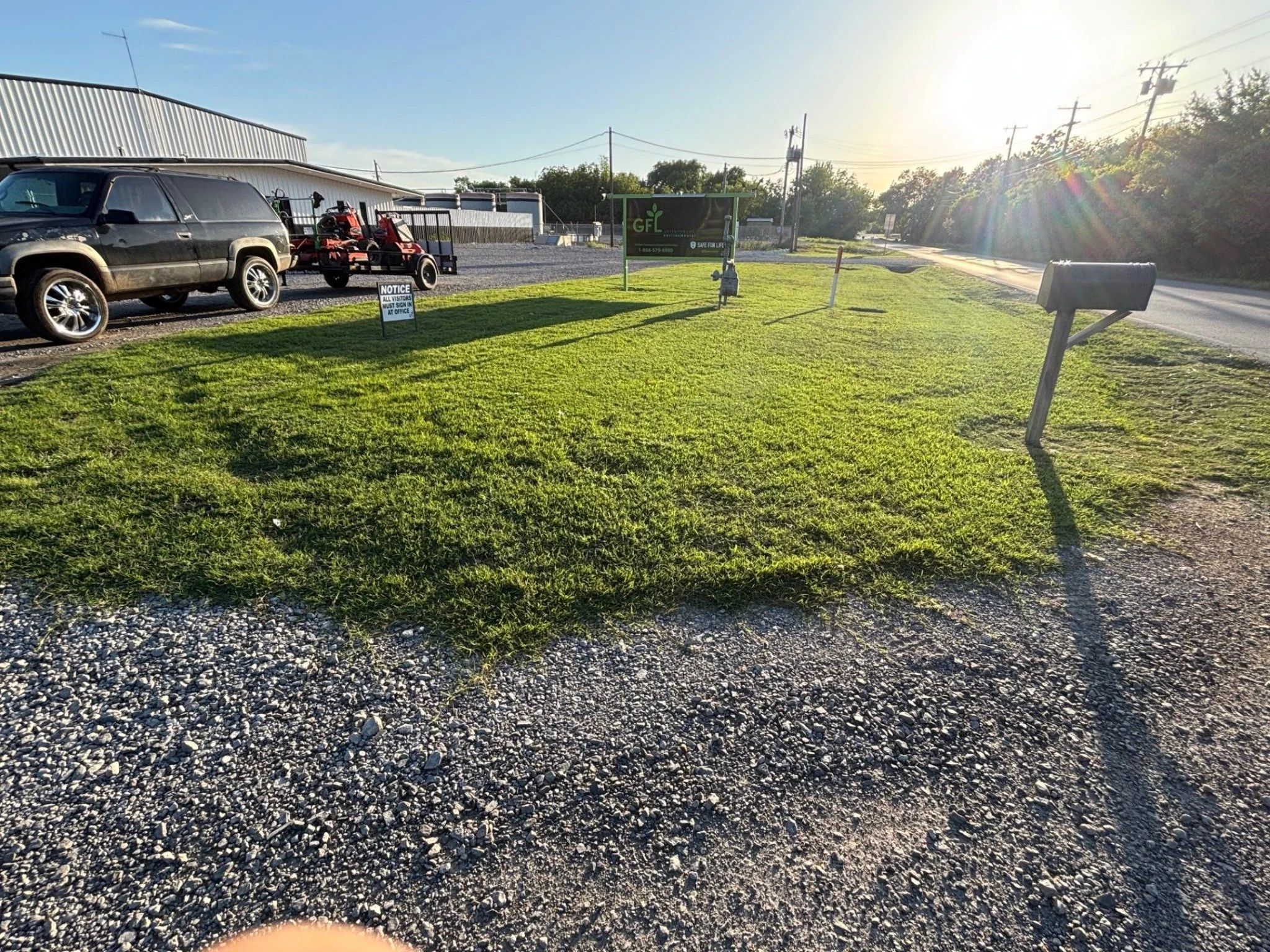 Commercial lawn service completed for GFL Environmental in Cushing Oklahoma front entrance property maintenance.