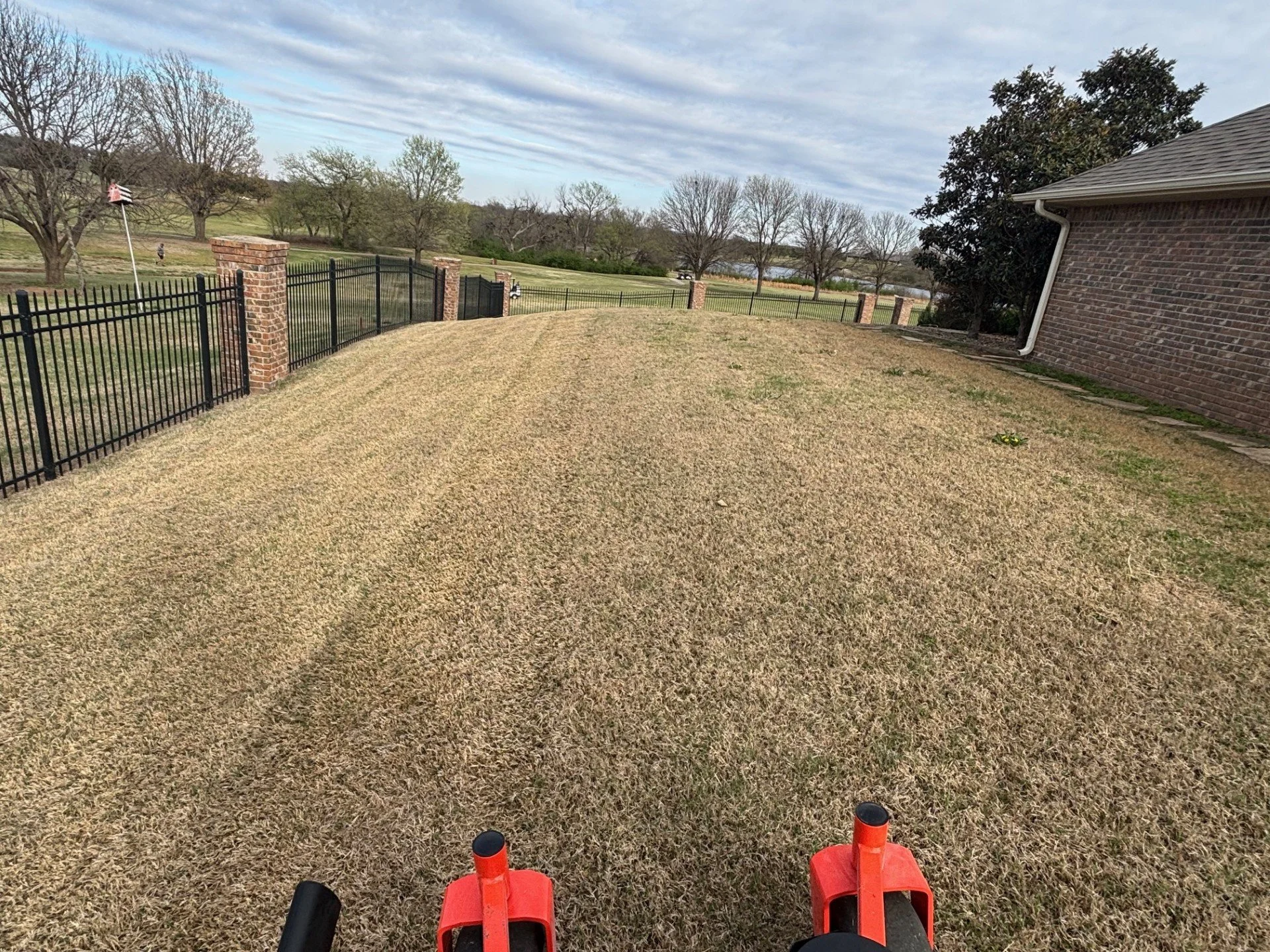 Weekly lawn maintenance in Cushing, Oklahoma – residential property kept clean and healthy on schedule