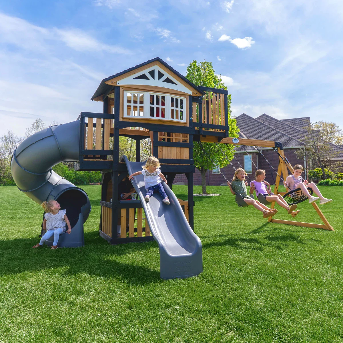 Backyard Discovery wooden backyard playset with swings and slide
