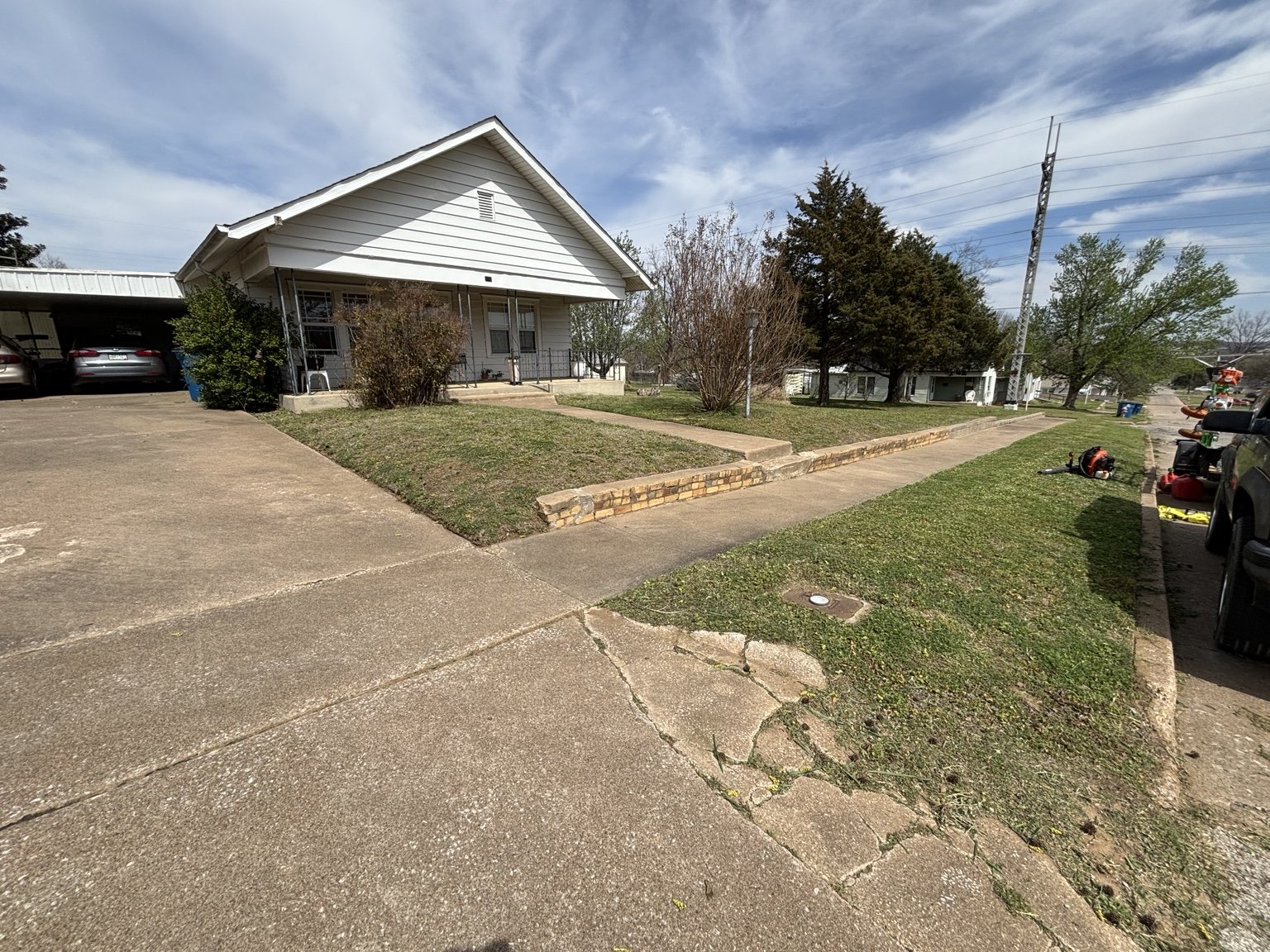 Residential lawn care service in Drumright, Oklahoma featuring bi-weekly mowing, edging, and trimming to maintain a clean and professional-looking property.