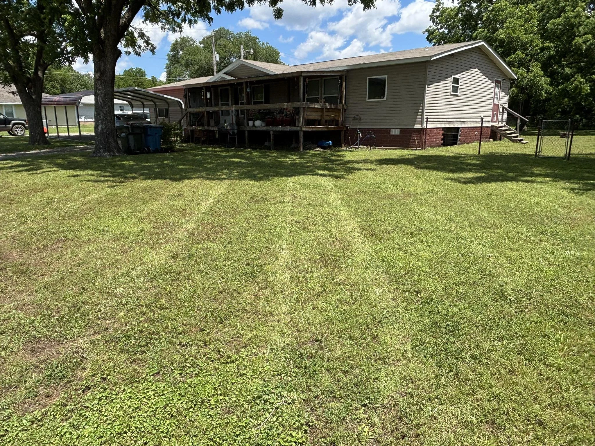 Residential bi-weekly lawn mowing service in Cushing, OK by Cardinal Outdoor Services