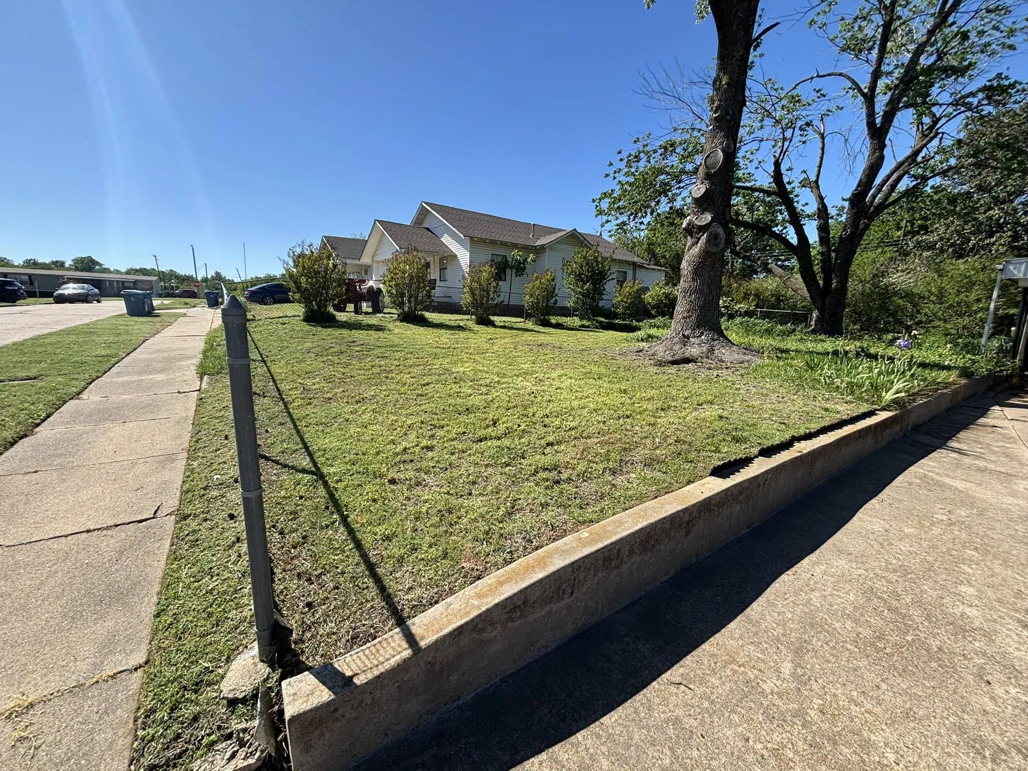 One-time lawn service in Stillwater, Oklahoma, including mowing and cleanup of an overgrown backyard for a clean, usable space.