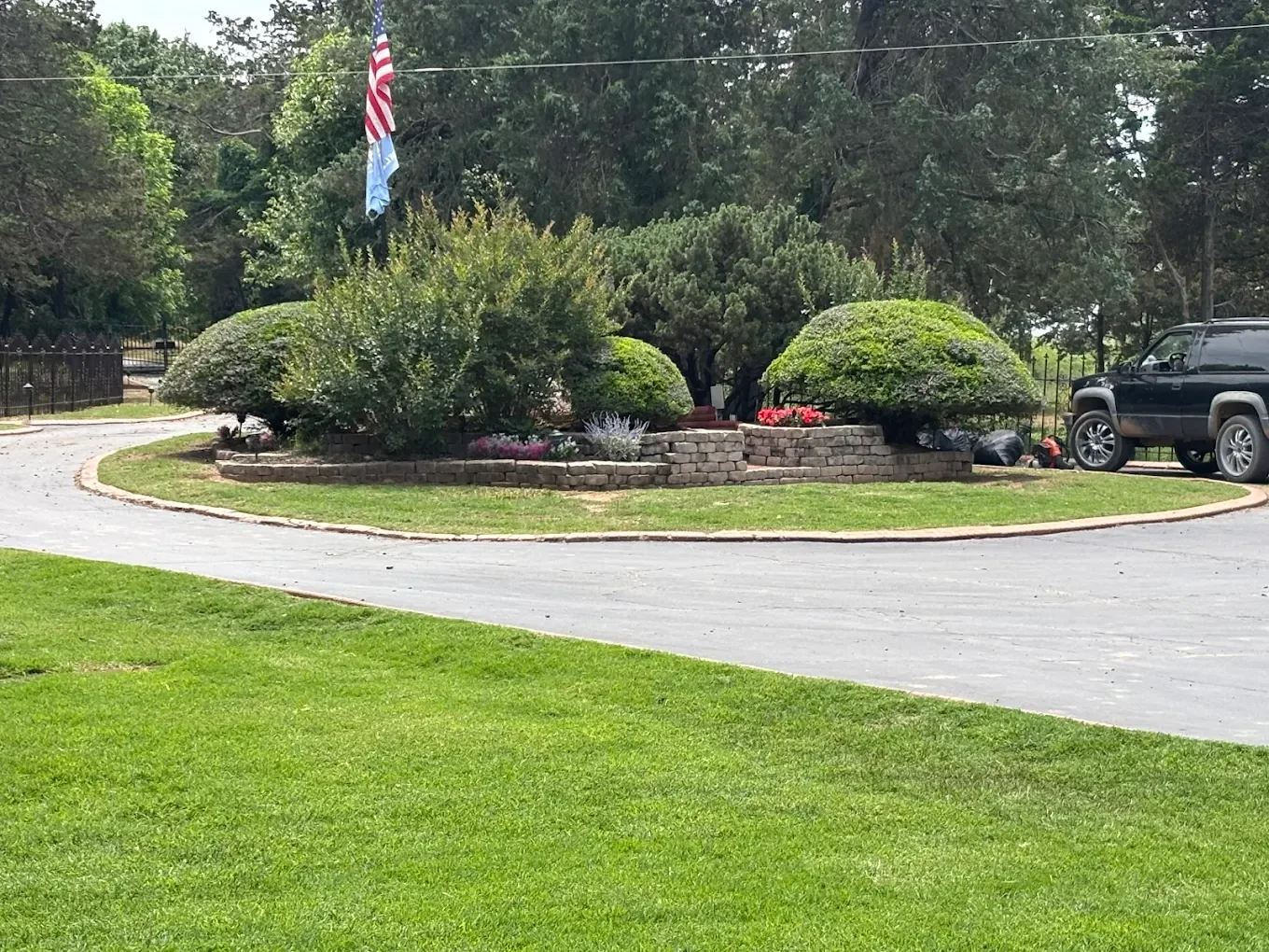 Routine landscape maintenance to keep shrubs trimmed, beds clean, and the property looking polished season after season.