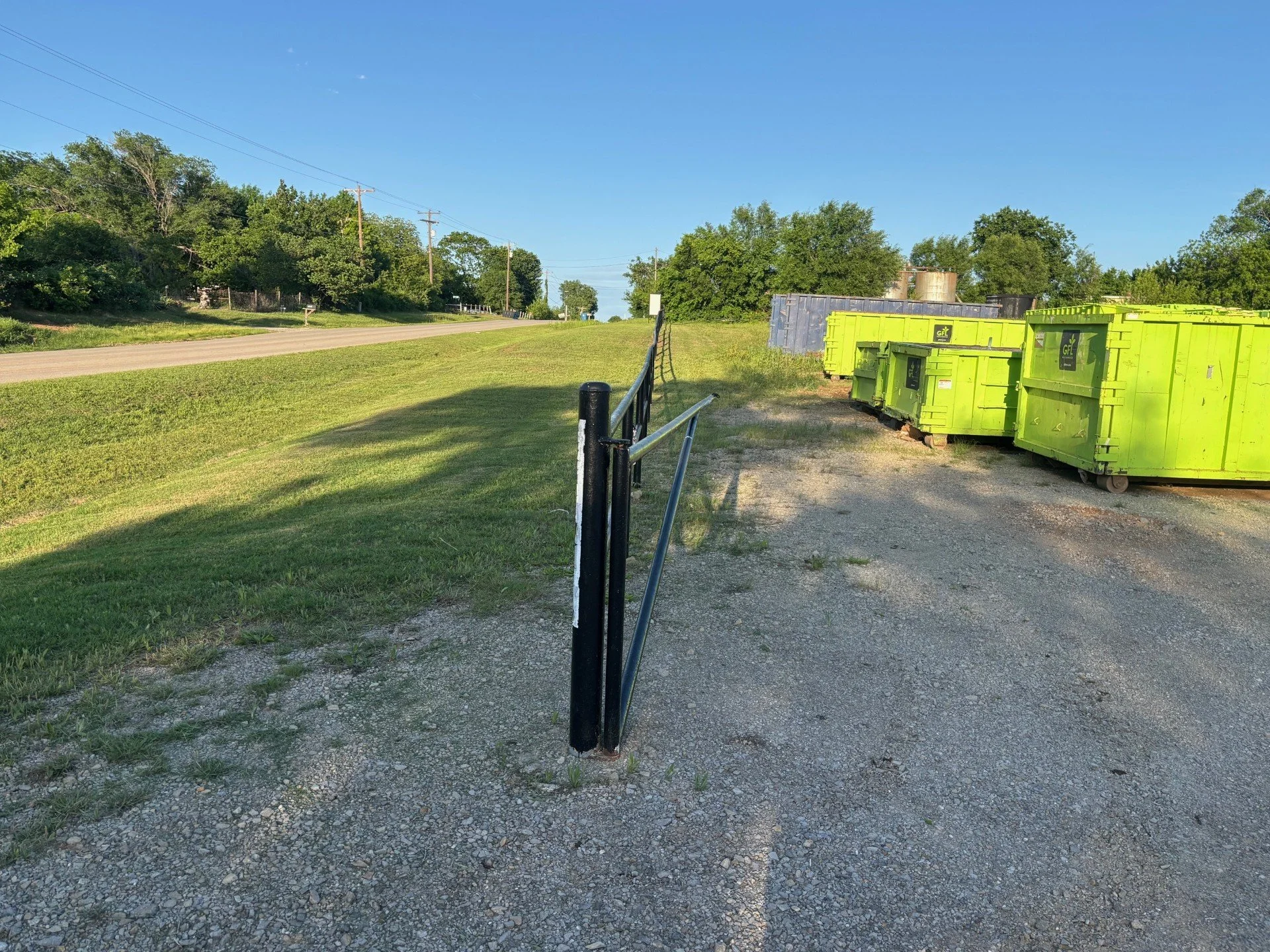 Fence line mowing and grounds maintenance for GFL Environmental in Cushing Oklahoma.