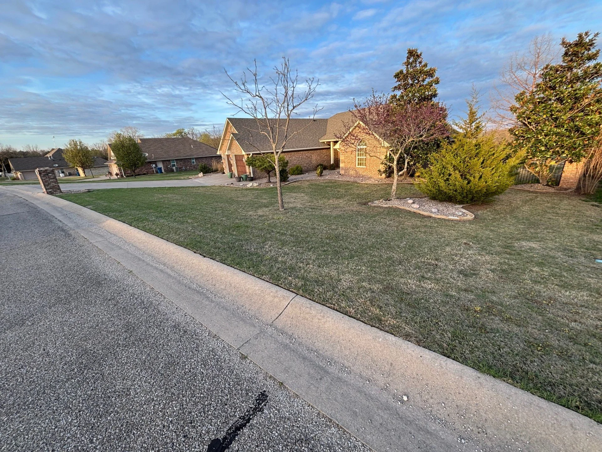 Professional lawn service in Cushing, Oklahoma – routine weekly mowing keeping property clean and maintained