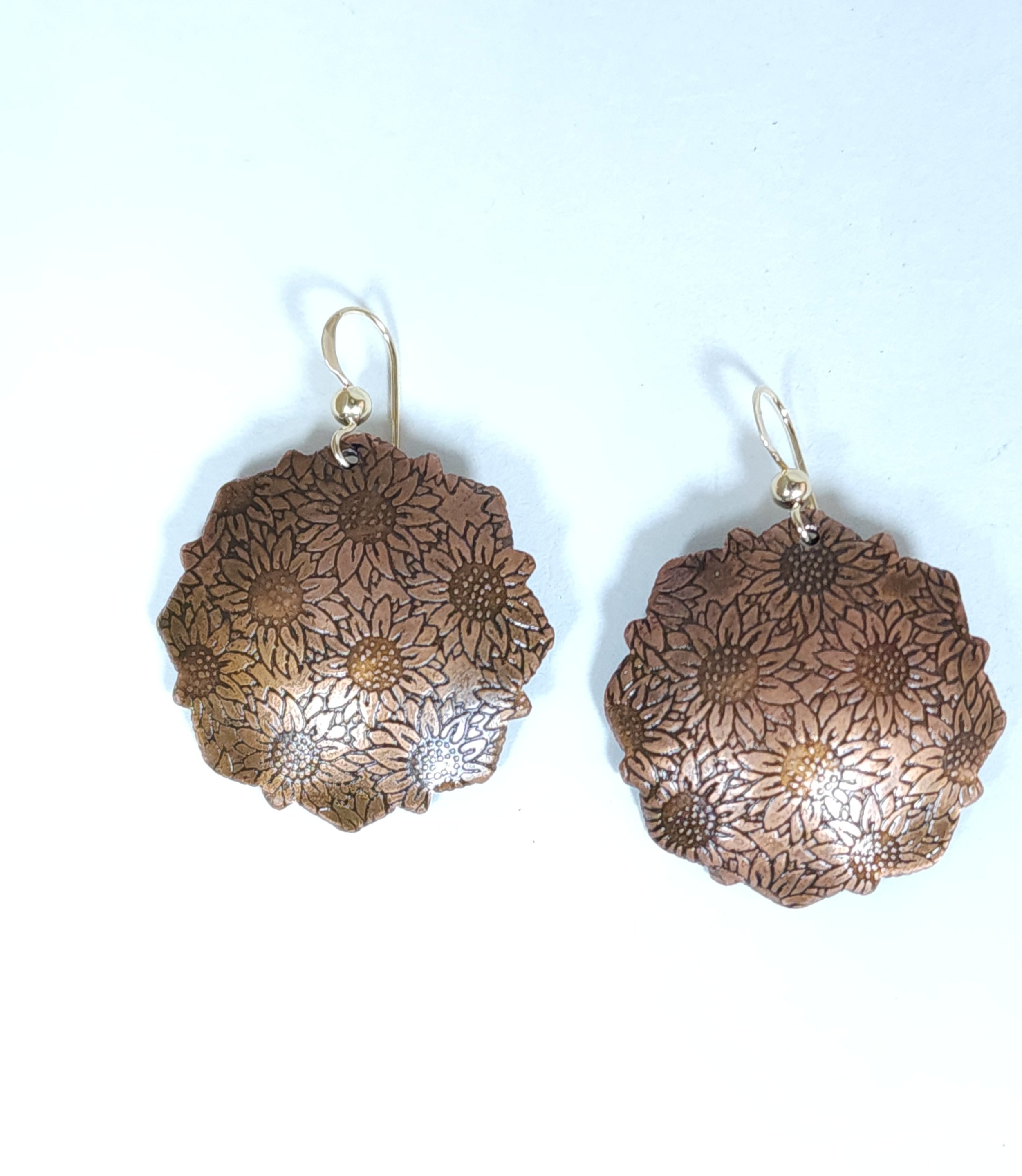 Domed sunflower earrings 2.jpg