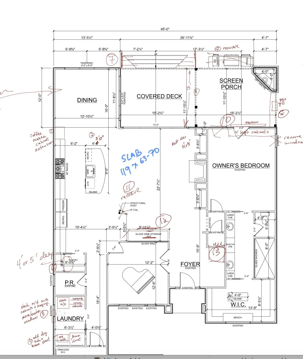 Blueprint of a house floor plan with rooms labeled, handwritten notes, and dimensions.