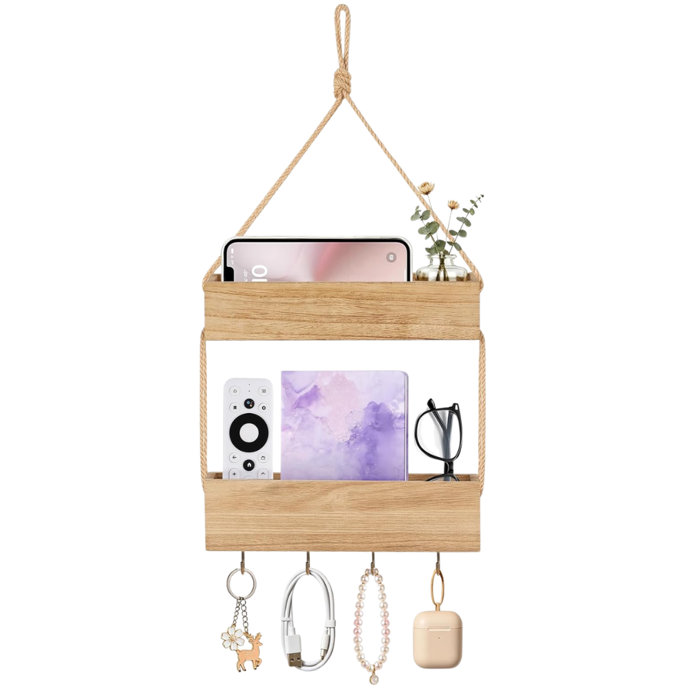 Wooden hanging shelf with a smartphone, small plant, remote control, tablet, glasses, and four keychains/charms at the bottom.