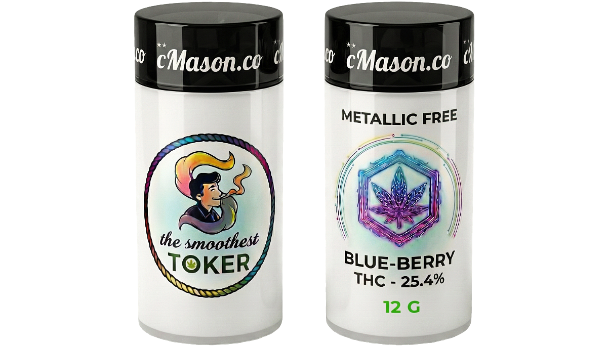 Two cylindrical containers with black lids featuring the brand name 'Mason.co.' The left container has a colorful illustration of a woman smoking, with a rainbow-colored rope border and the text 'the smoothest TOKEN' with a small cannabis leaf icon. The right container has a holographic image of a cannabis leaf, with the text 'METALLIC FREE,' 'BLUE-BERRY THC - 25.4%,' and '12 G' in green.