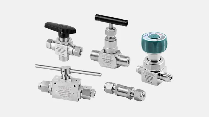 Collection of FITOK valves and fittings, including ball valves and pressure regulators, arranged on a white background.