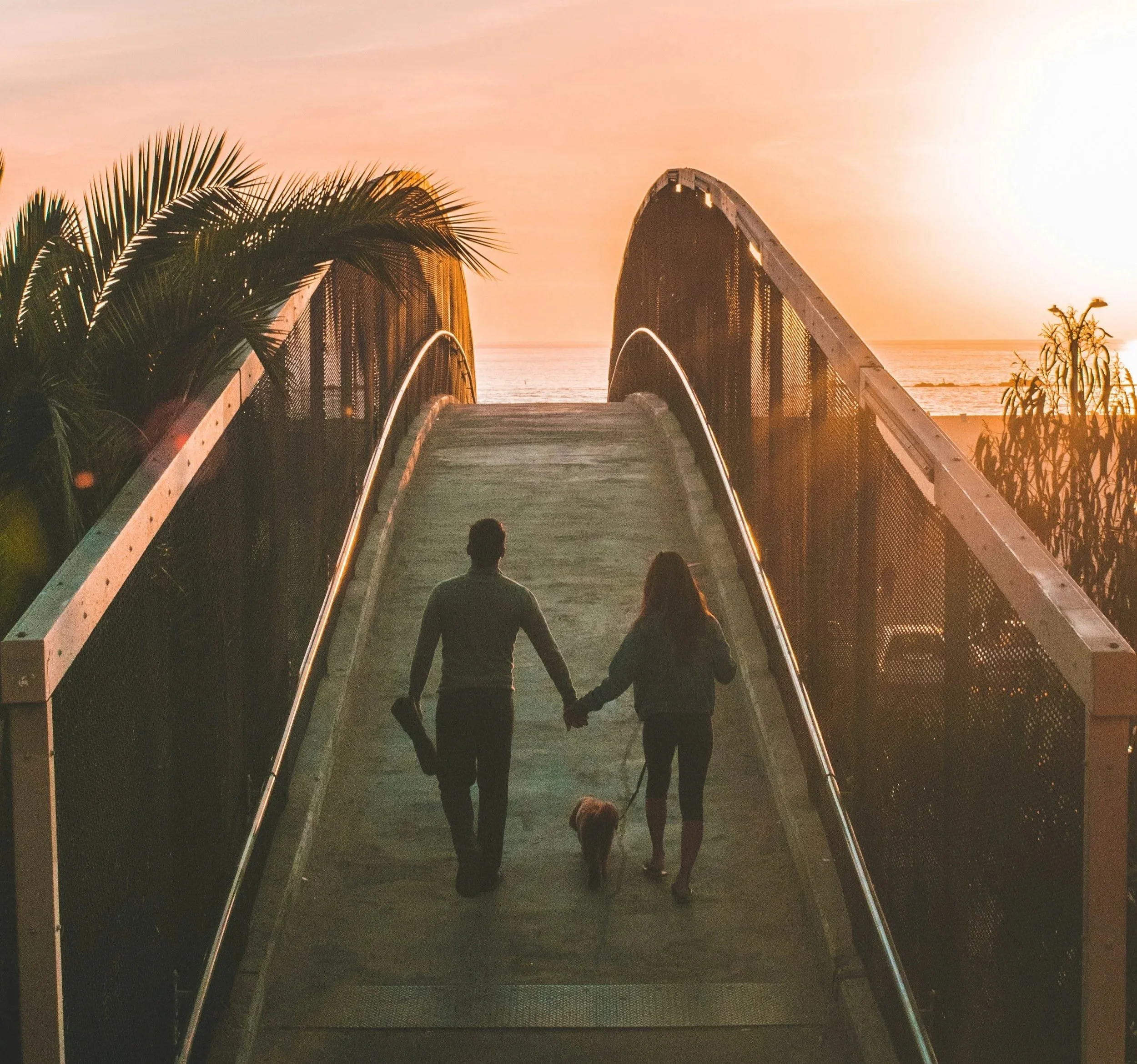 Couples Therapy - A couple walking hand in hand.