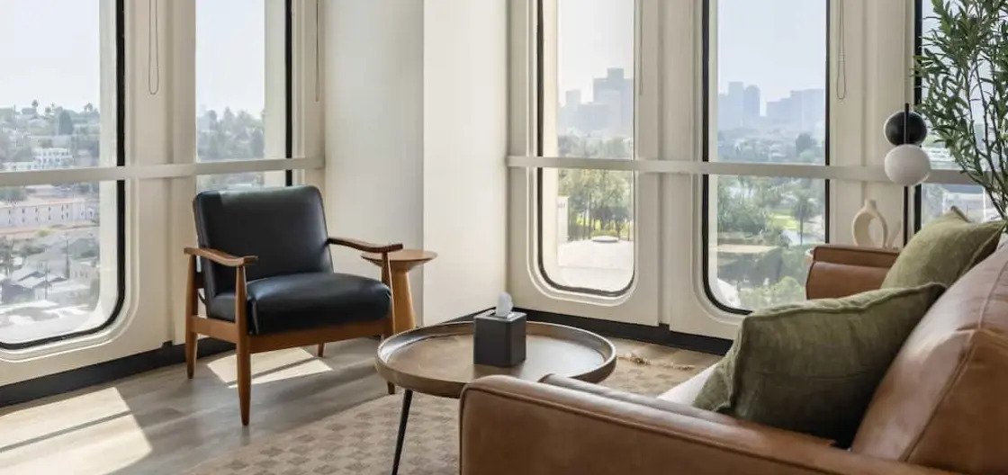 The Therapy Well Echo Park office interior with modern furniture and large windows.