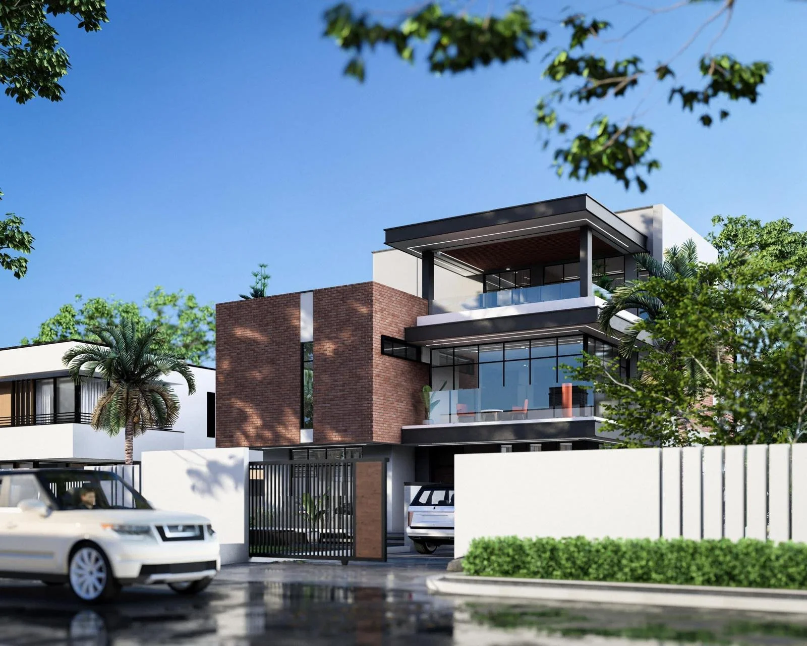 Modern three-story house with large glass windows, brick and white exterior, surrounded by trees, with cars parked in driveway