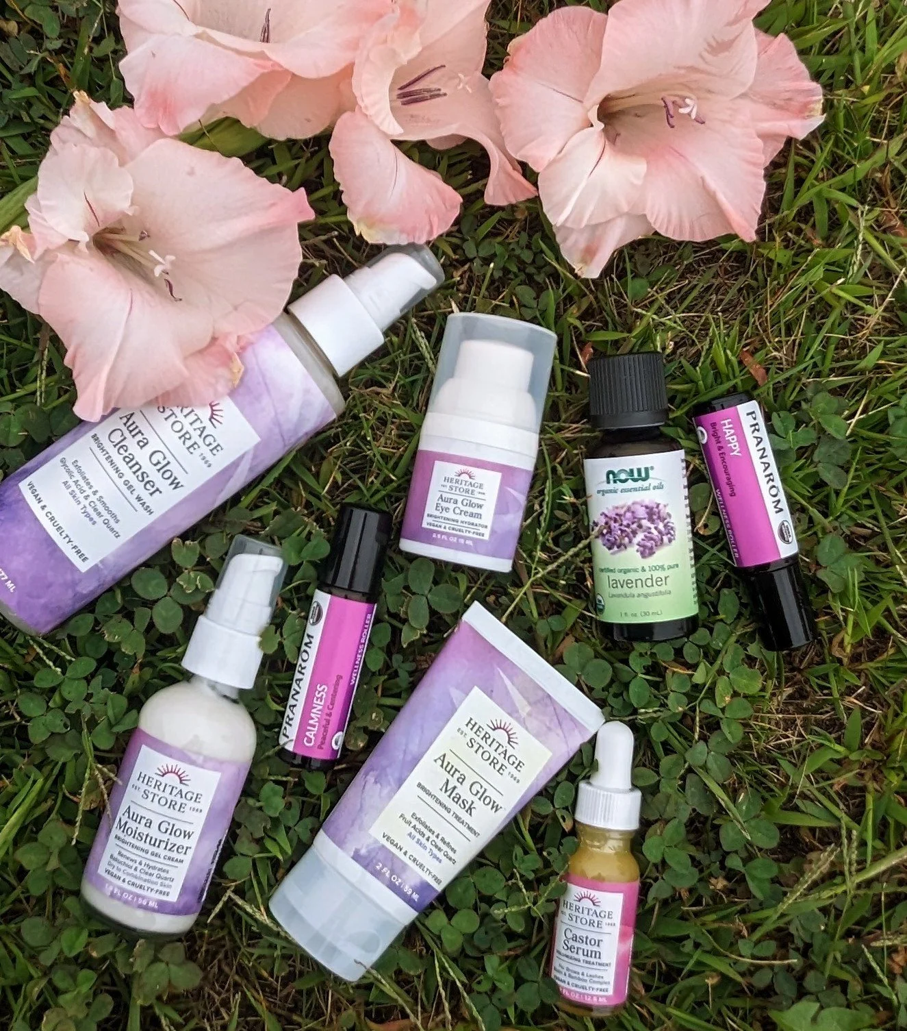 Natural skincare items featuring a cleanser, moisturizer, face mask, eye cream, serum and essential oils.