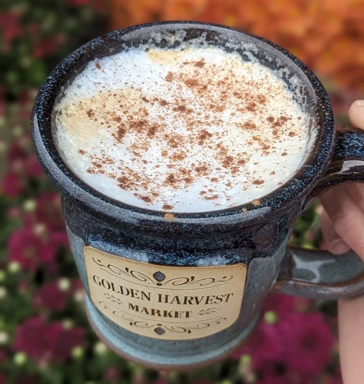 Warm cinnamon latte in Golden Harvest Ceramic mug.