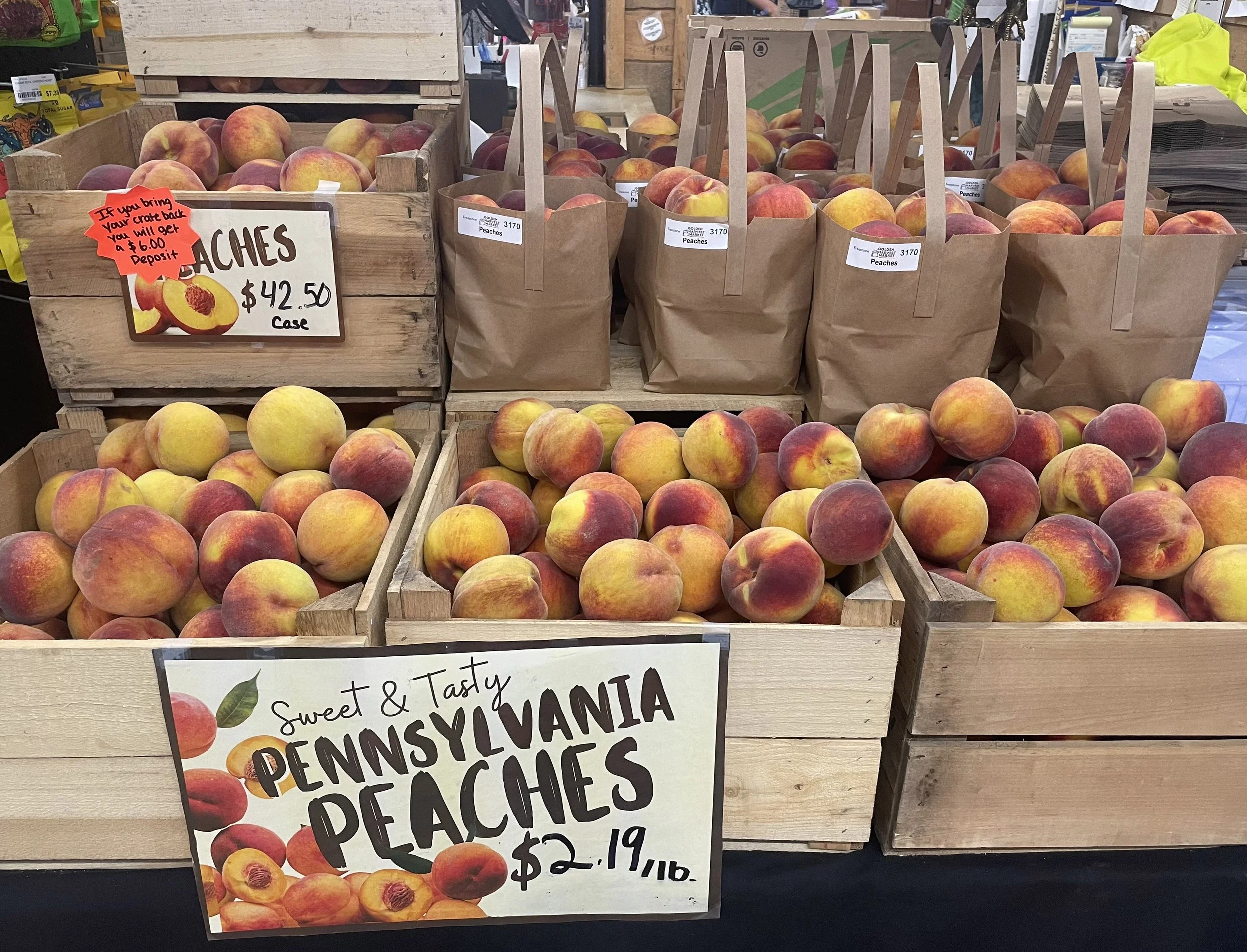 Pennsylvania peaches in wooden crates.