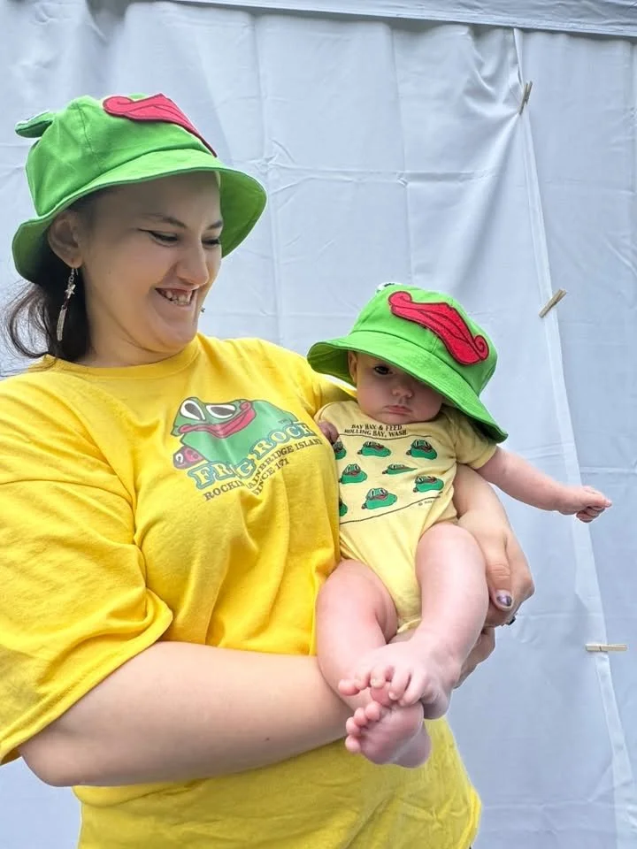 Frog fits alert! Emma & baby Hazel. Fourth of July Street Fair 2026
