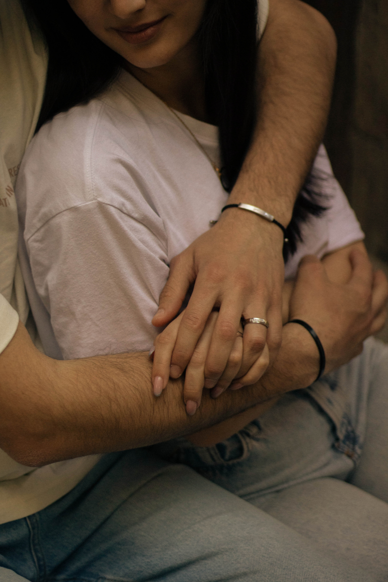 married couple holding hands