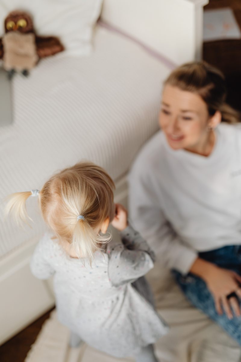 mom and daughter playing