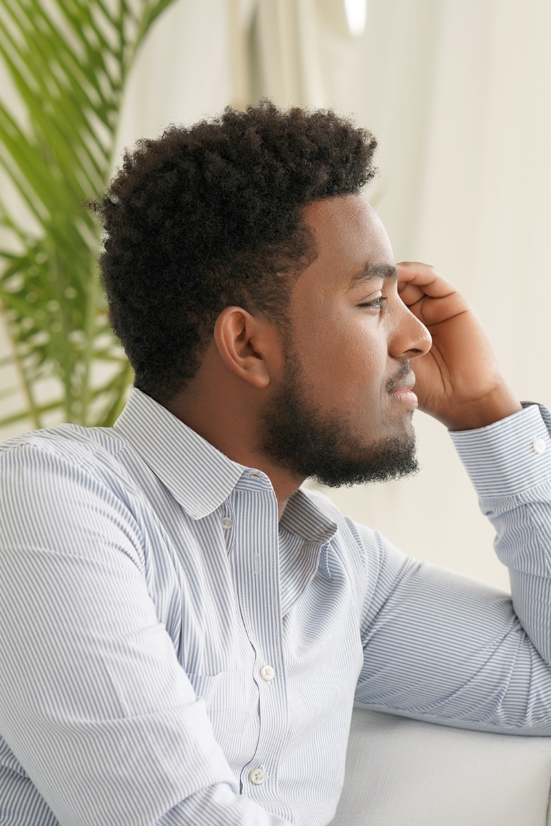 man experiencing symptoms of anxiety