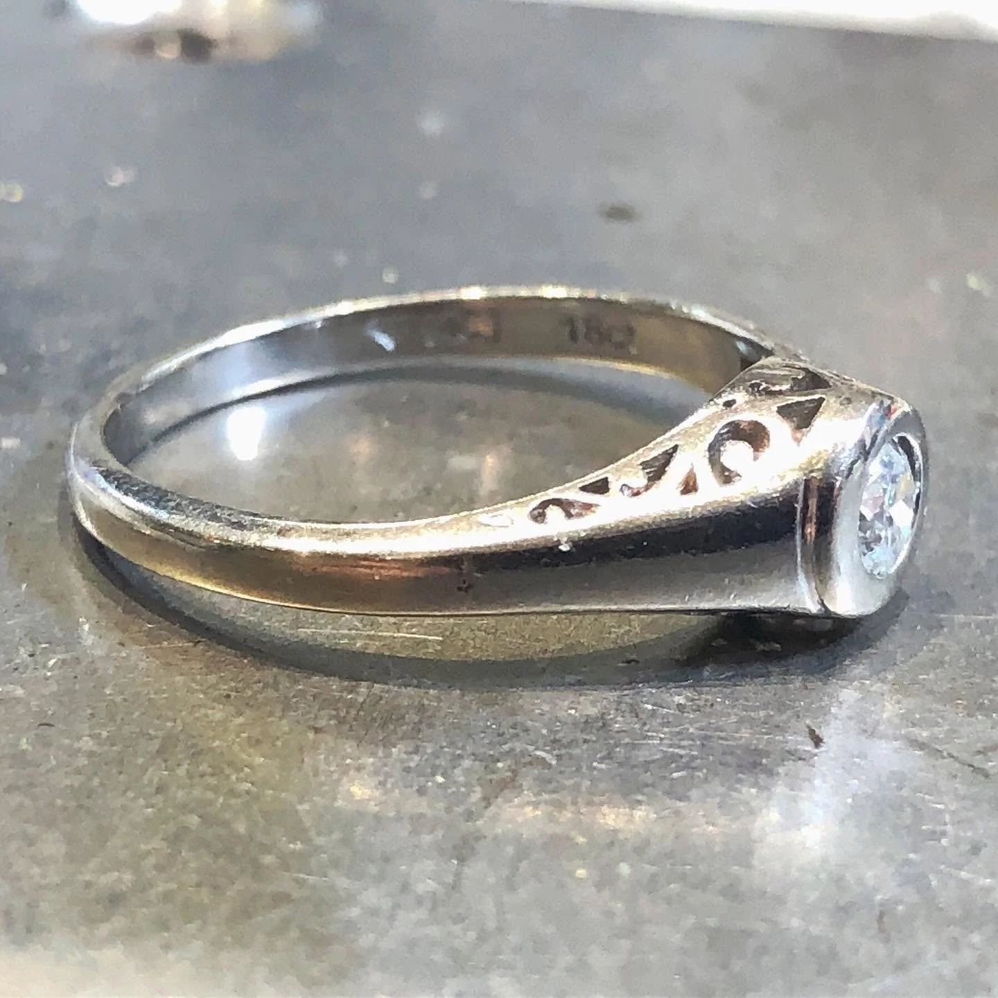 Diamond ring before engraved and pierced detailing was added