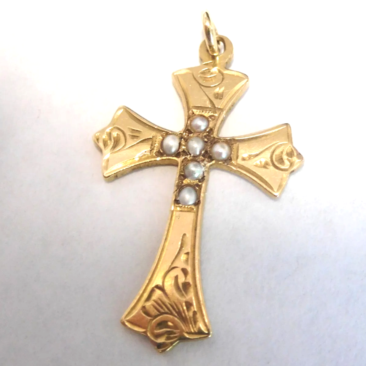 Antique gold cross pendant after seed pearl replacement and restoration