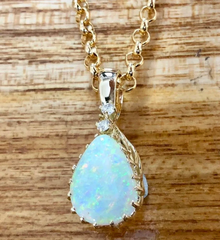 Opal pendant made from the remaining opal and original ring setting