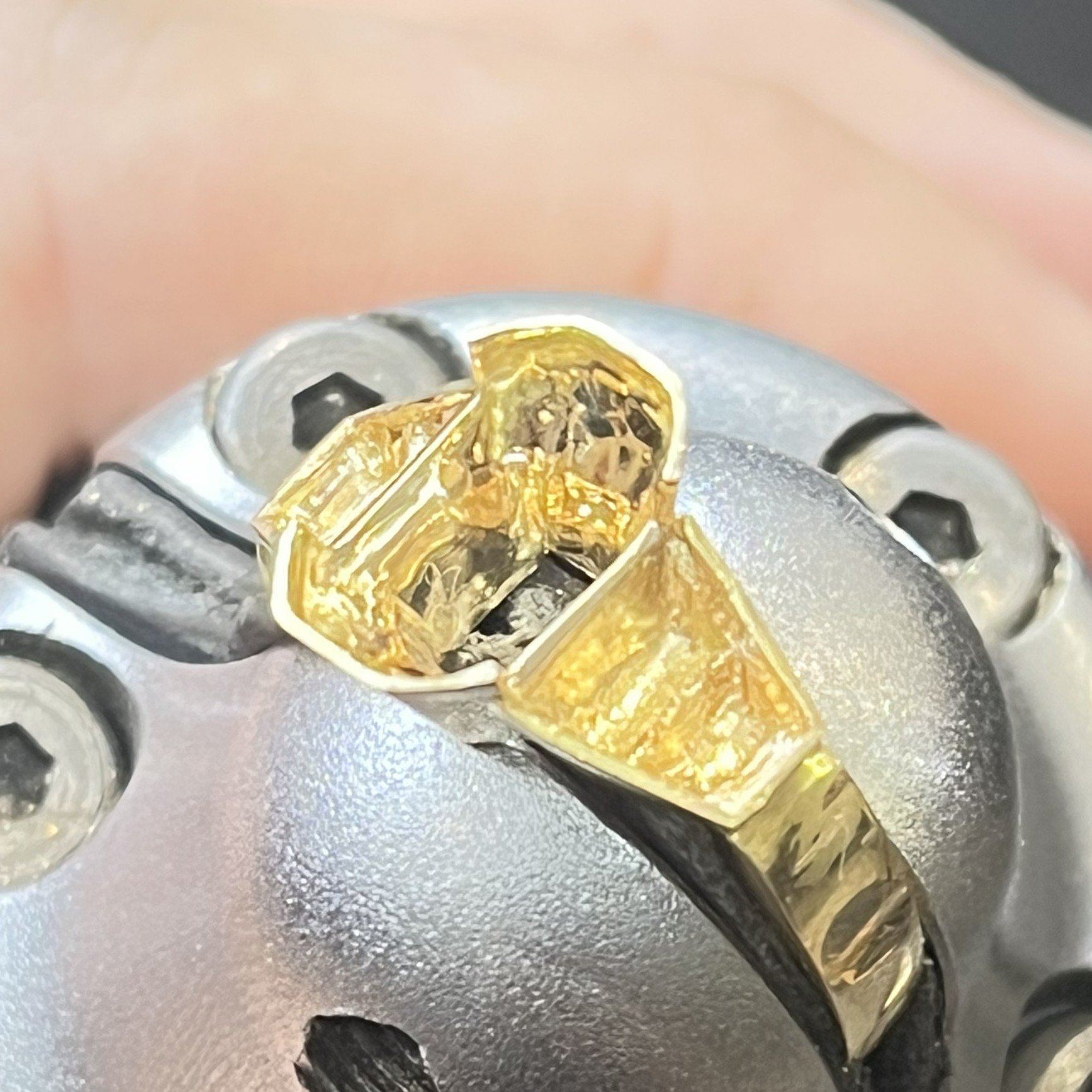Setting diamonds in a handmade sapphire engagement ring