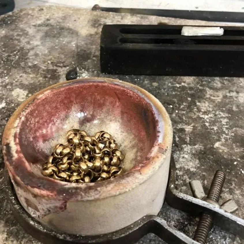 Old gold about to be melted and reused.
