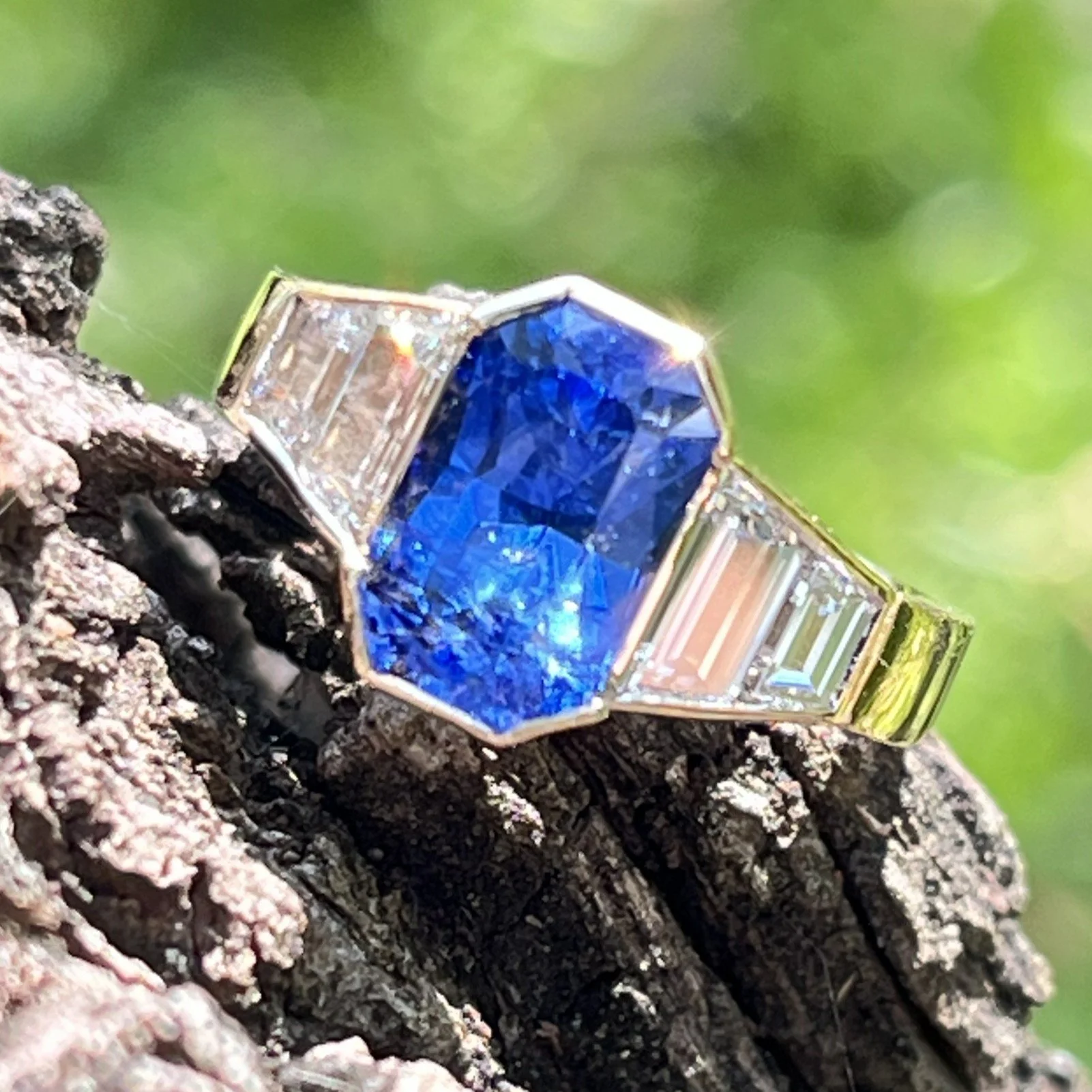 Emerald-cut Ceylon sapphire selected for a custom engagement ring