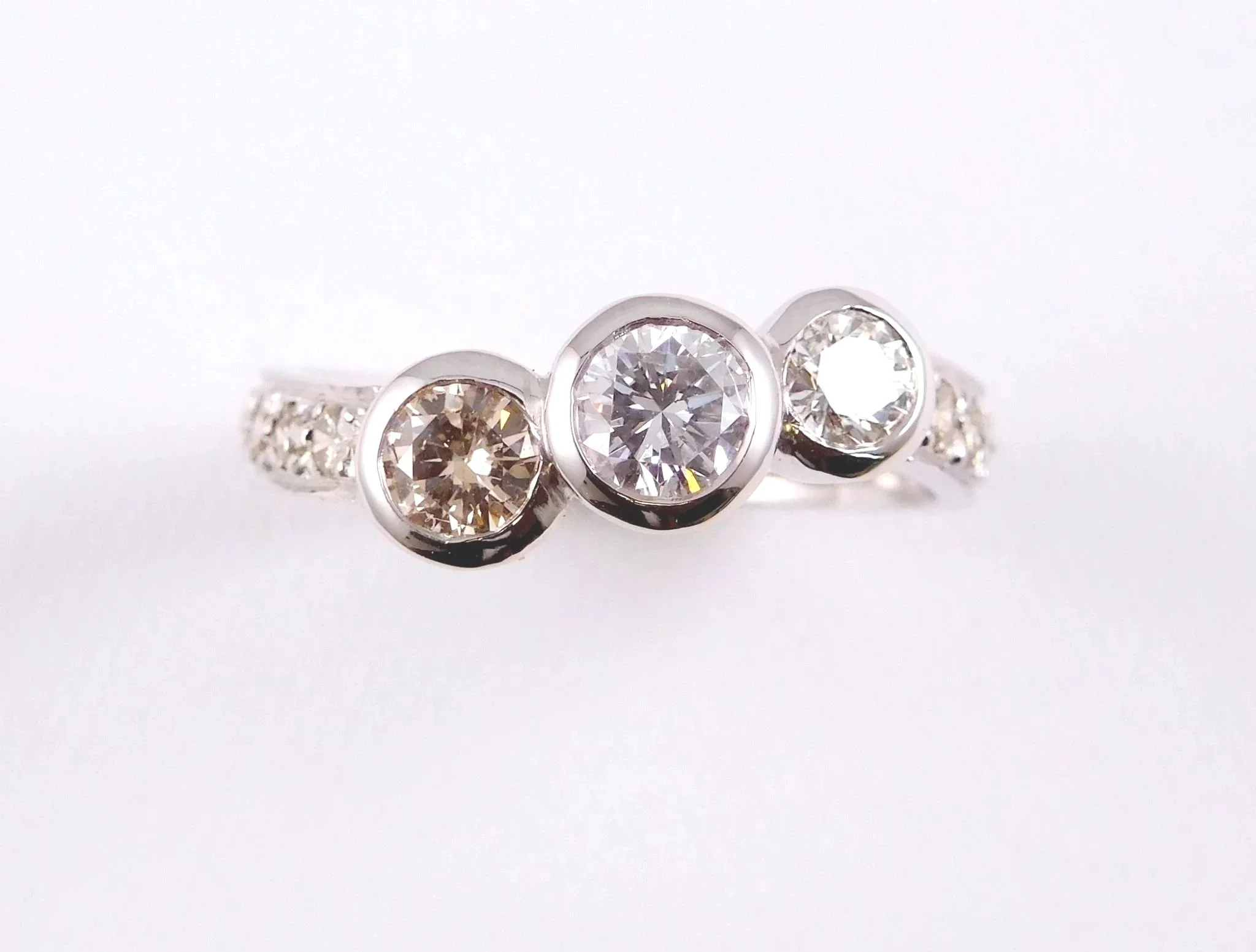 Handmade three-stone ring using diamonds from family jewellery