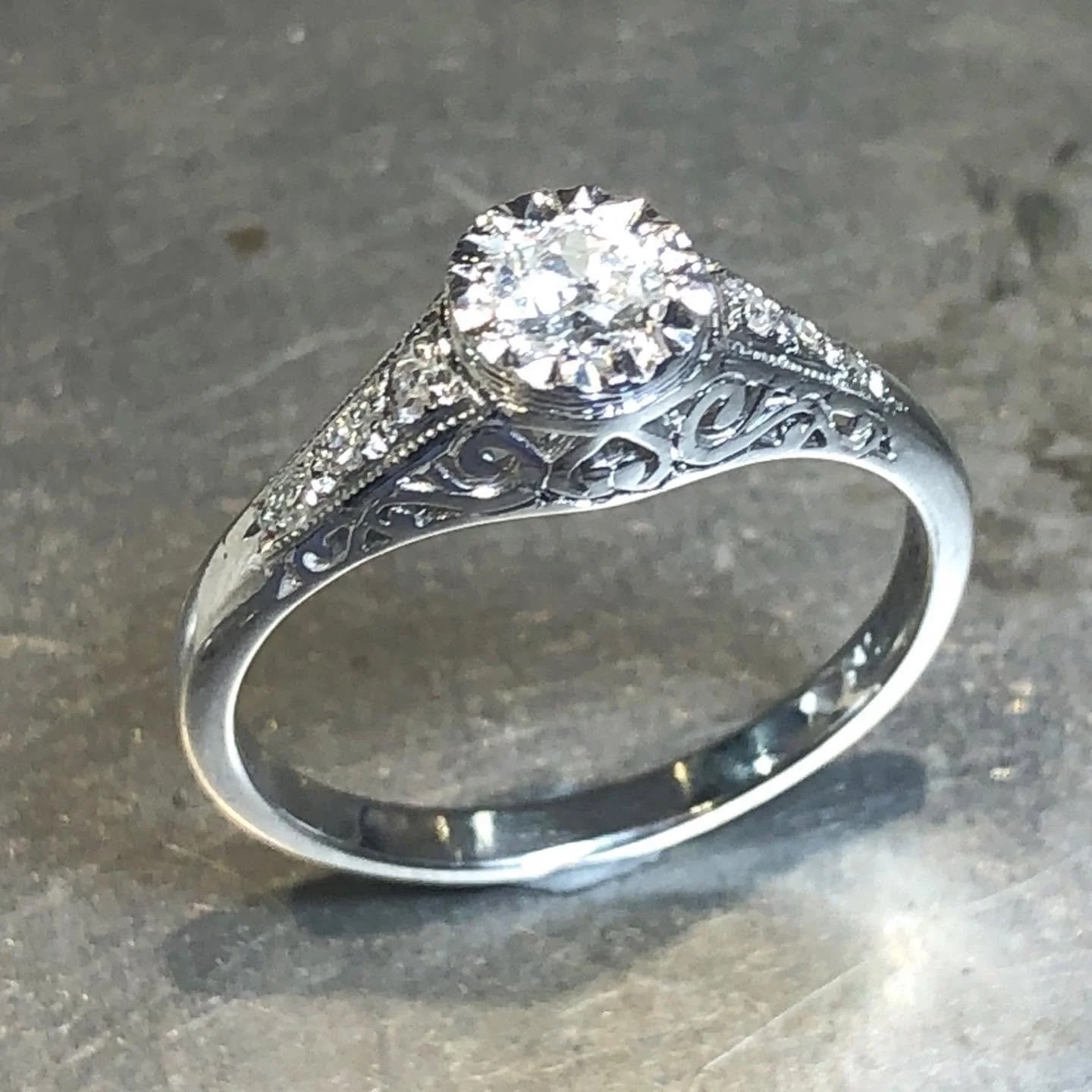 Diamond ring after engraving and pierced detail were added
