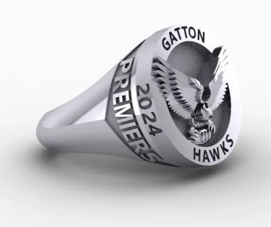 A silver ring with a logo for Gatton Hawks, featuring a hawk, the year 2024, and the words 'Presidents' and 'Gatton Hawks'.