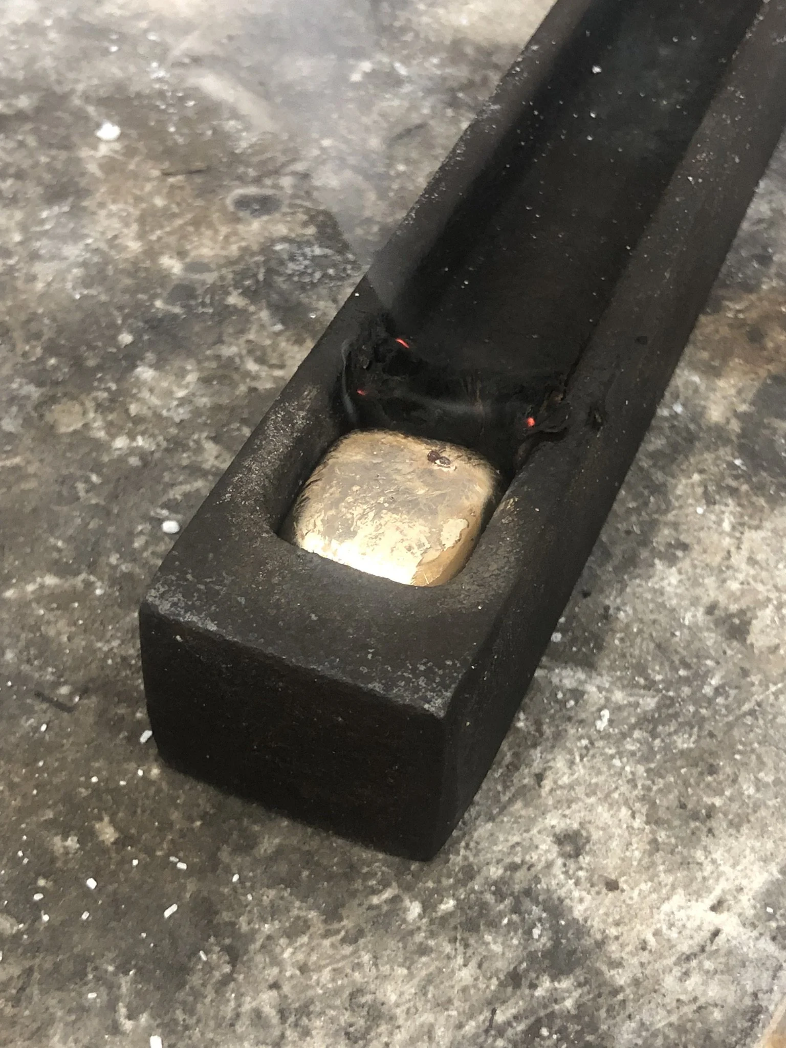 Melted down gold, cooling. 