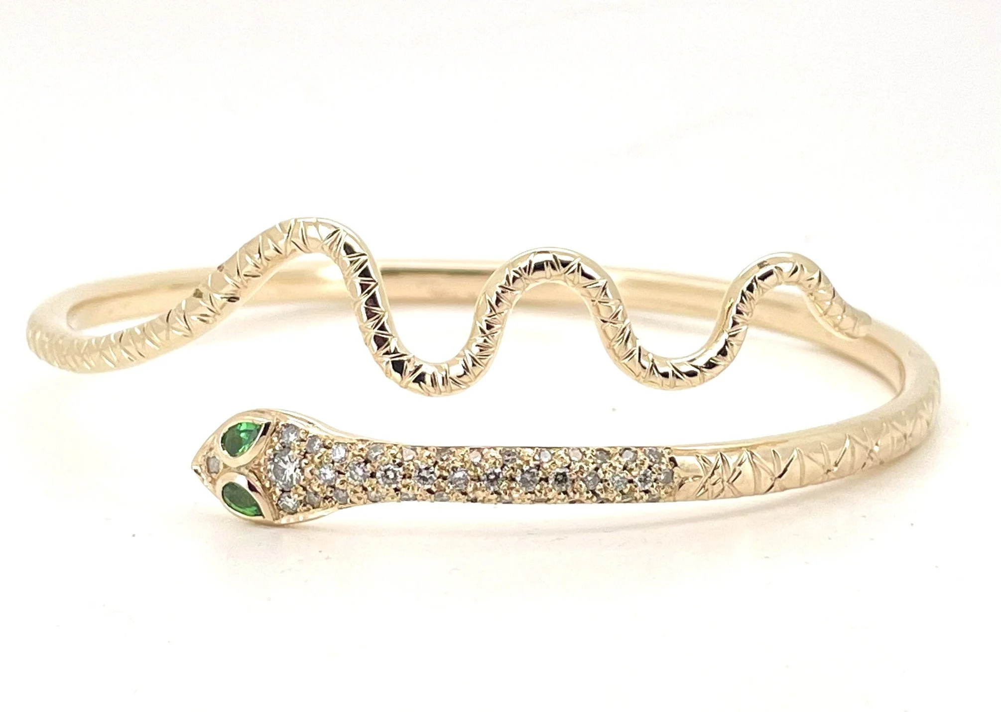 Cleopatra-inspired gold snake cuff handmade from client-supplied gold and diamonds