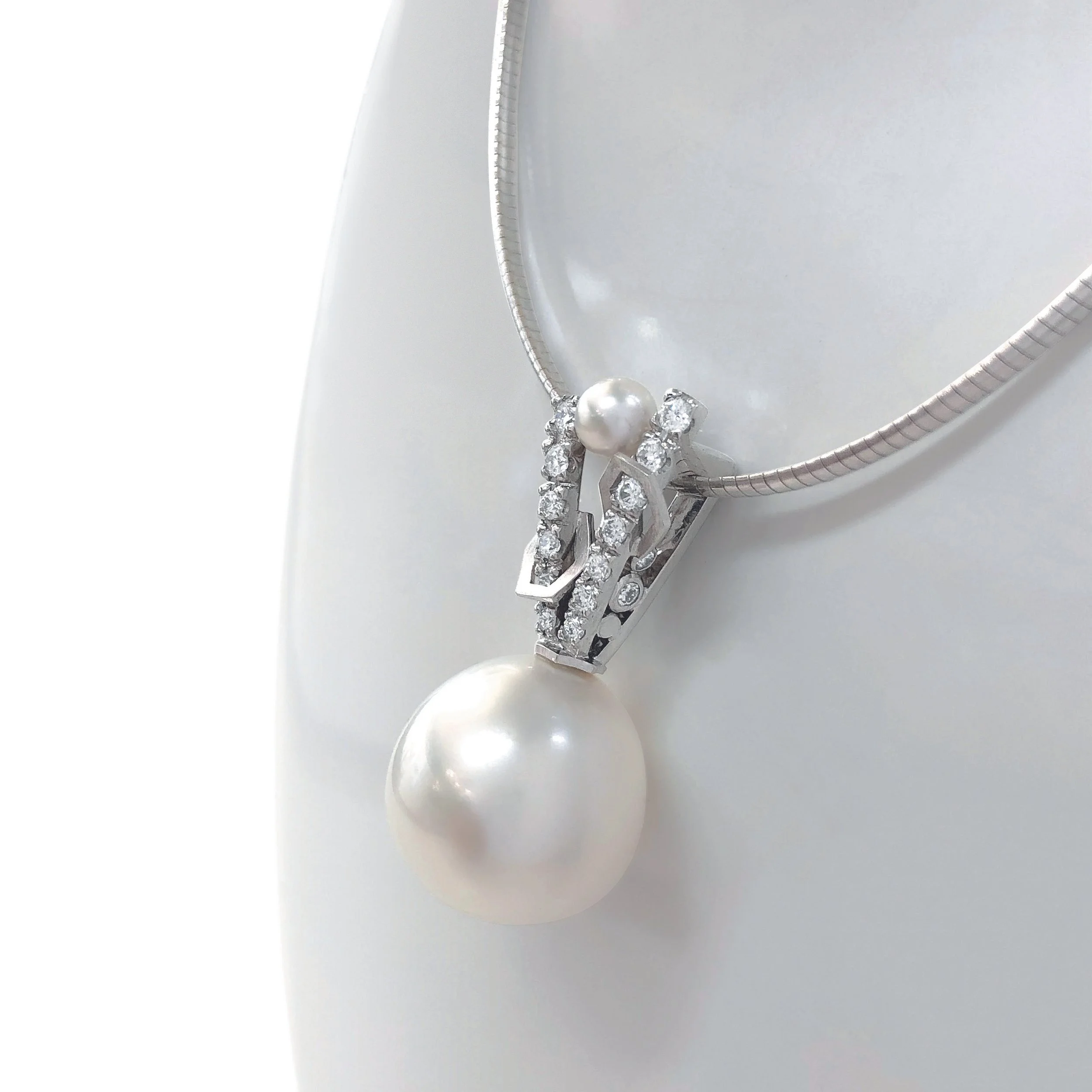 Diamond and south sea pearl pendant.