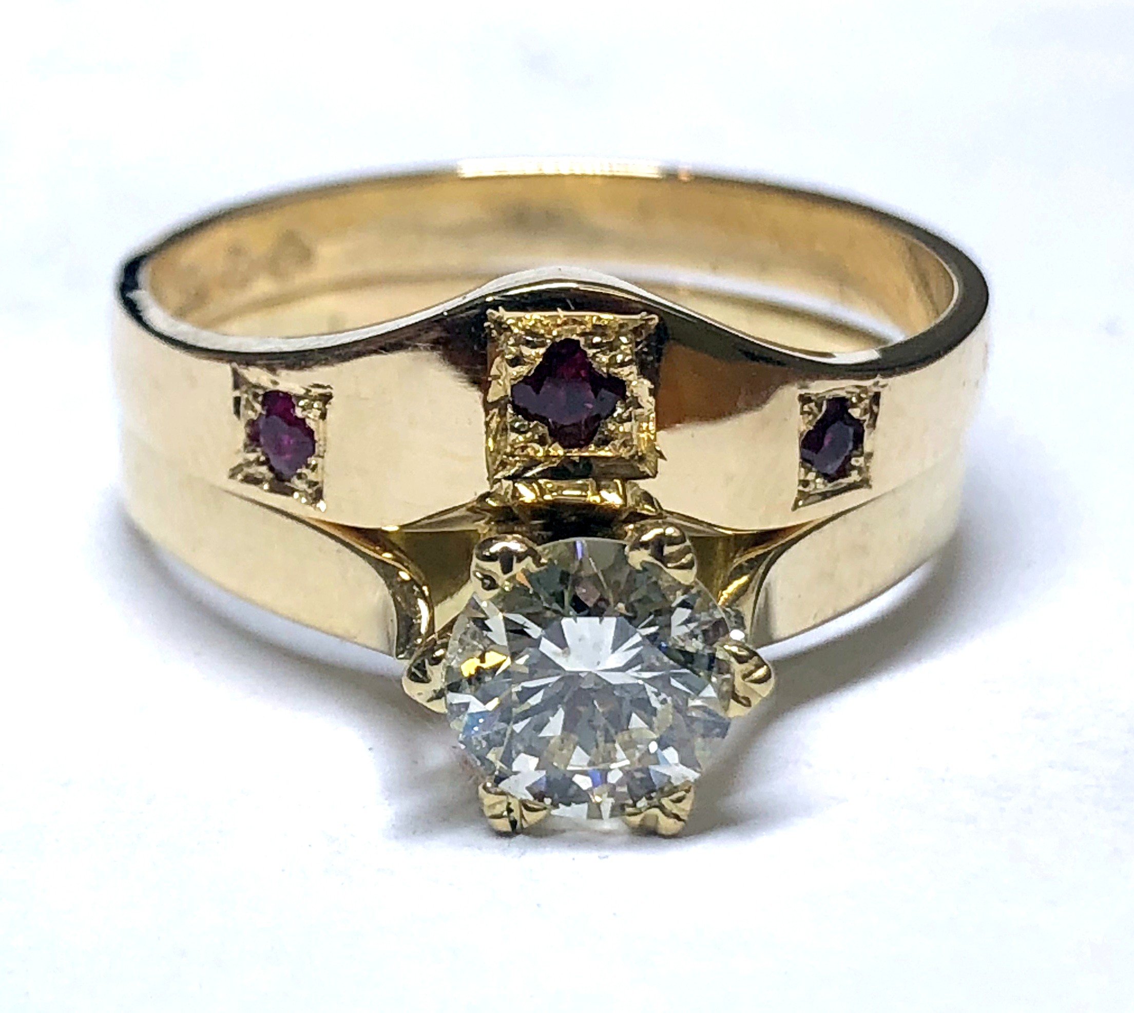 Close-up of a gold ring wedding set.