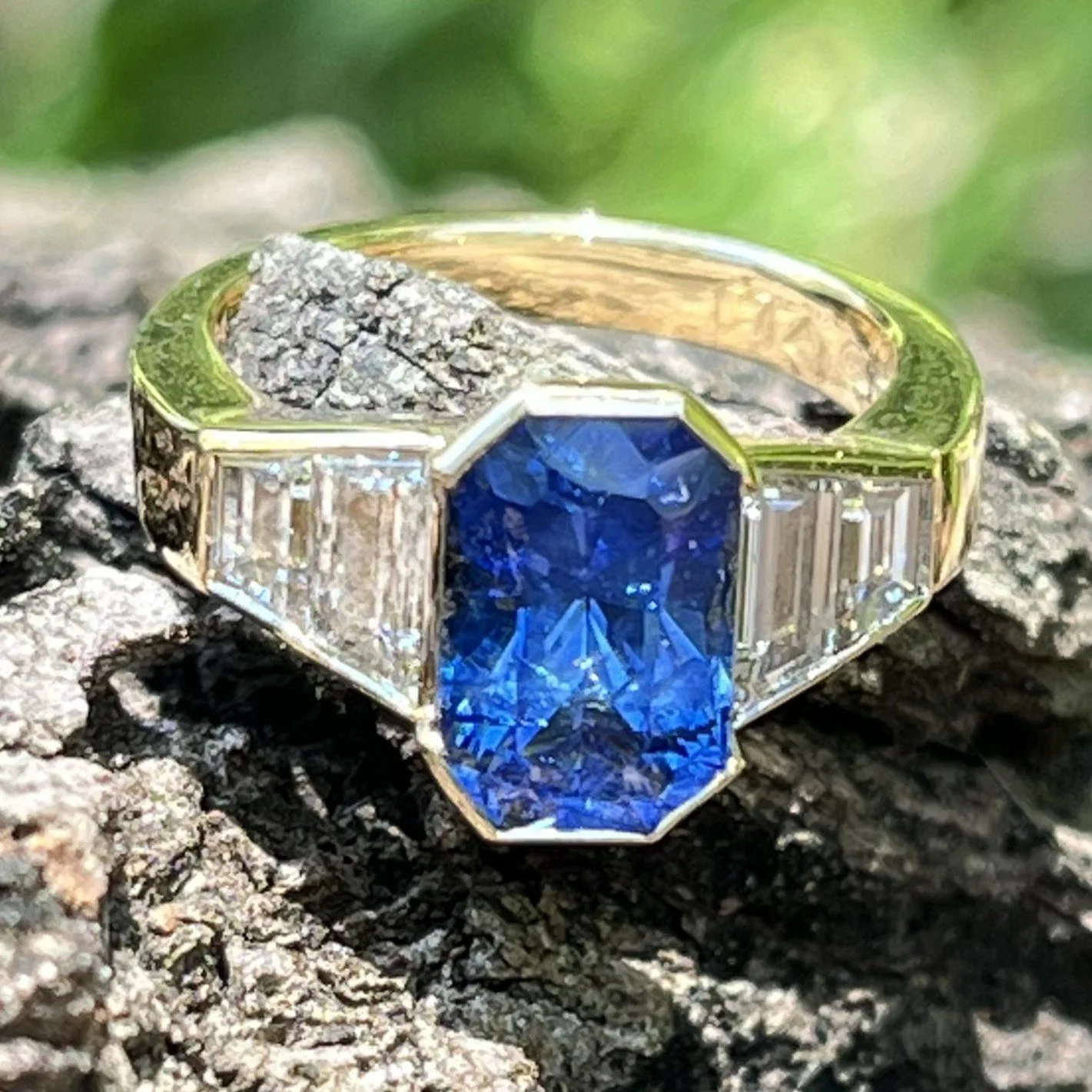 Finished Ceylon sapphire and diamond engagement ring in yellow gold