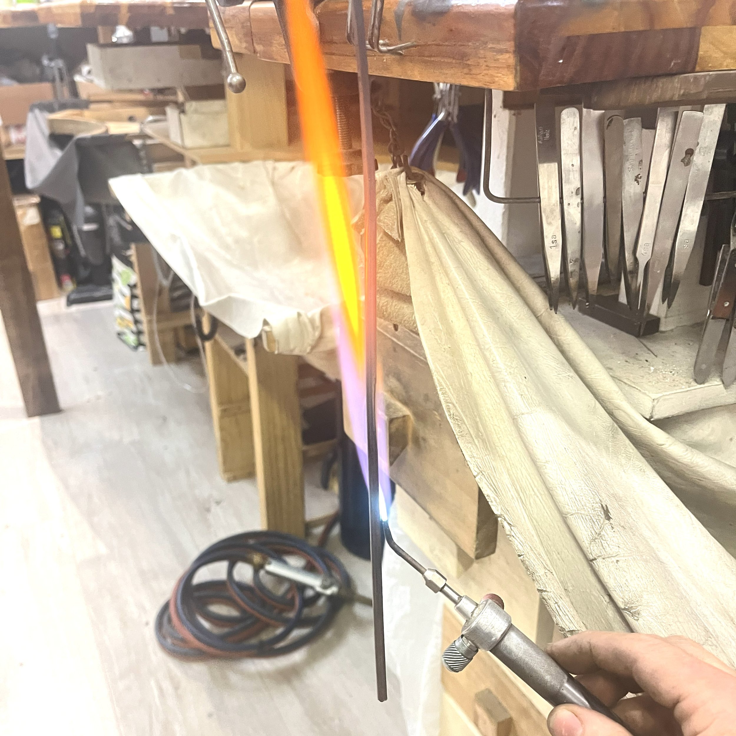 Gold being heated to be formed during the jewellery transformation process